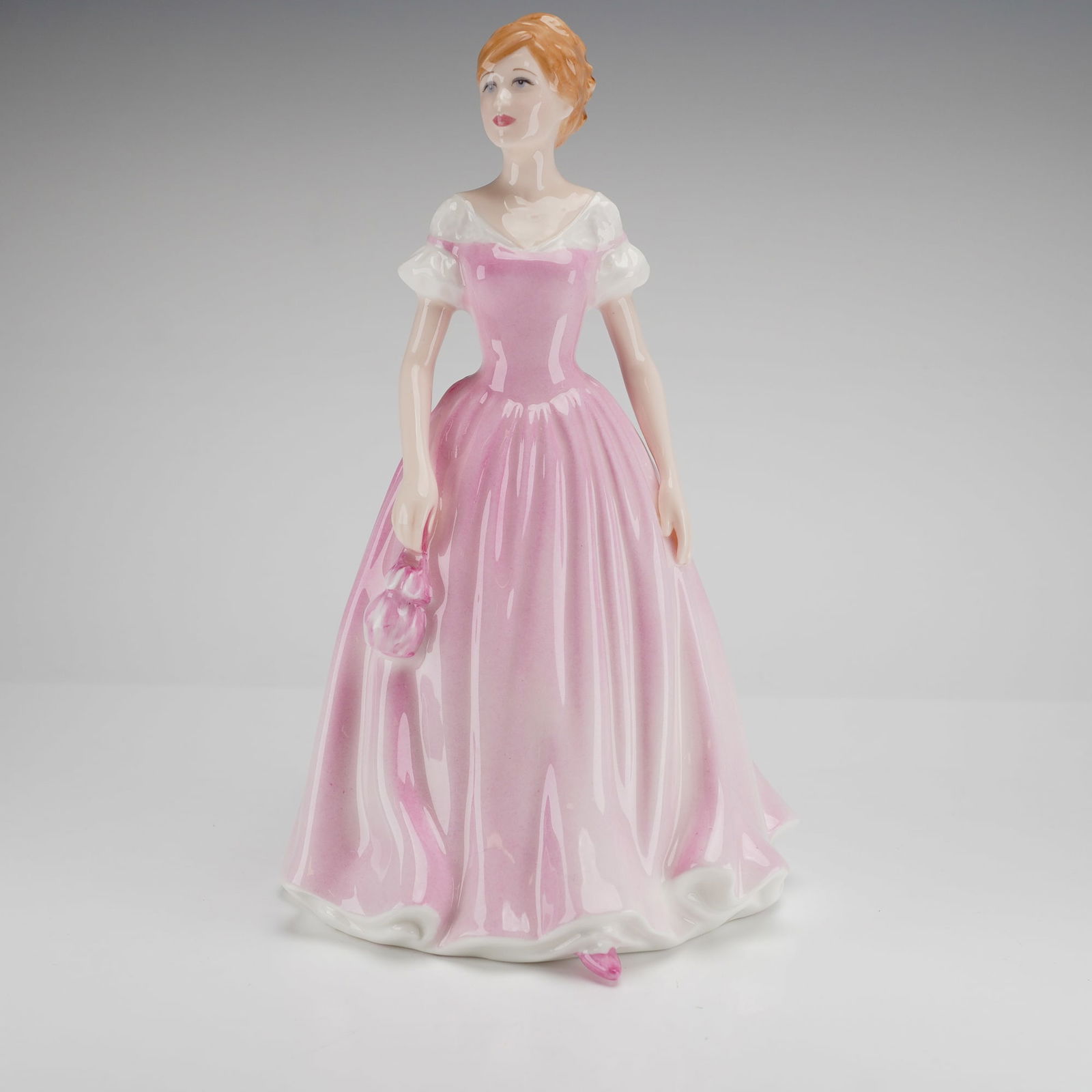 Royal Doulton Love of Life HN4529 Bone China Figurine: A single Royal Doulton Figurine, Love of Life HN4529, bone china, dated 2003 and sold in support of breast cancer charities, modeled by Nada M. Pedley. Dimensions: 5.00"L x 5.00"W x 8.00"H Weight: 1.0
