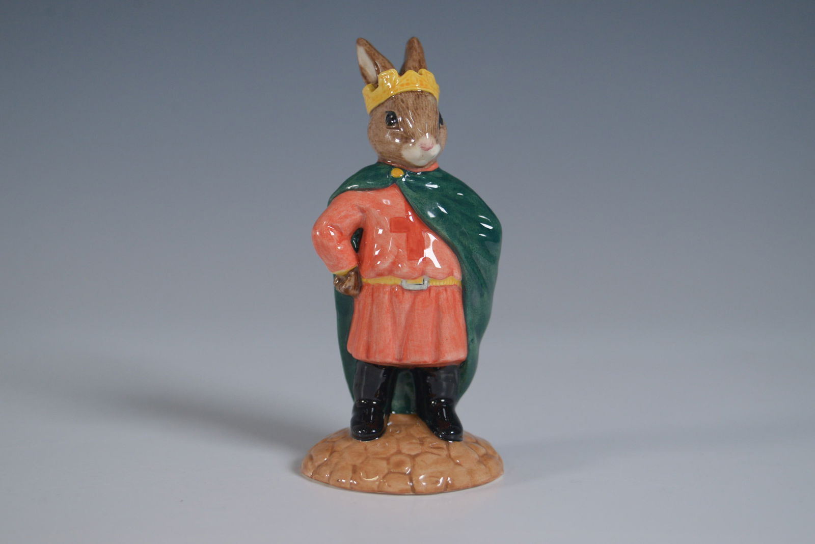 Royal Doulton Bunnykins Figurine, Prince John DB266: Royal Doulton Bunnykins figurine titled Prince John, model DB266, from the Robin Hood Collection. This hand-made and hand-decorated fine bone china figurine depicts Prince John in a regal pose,
