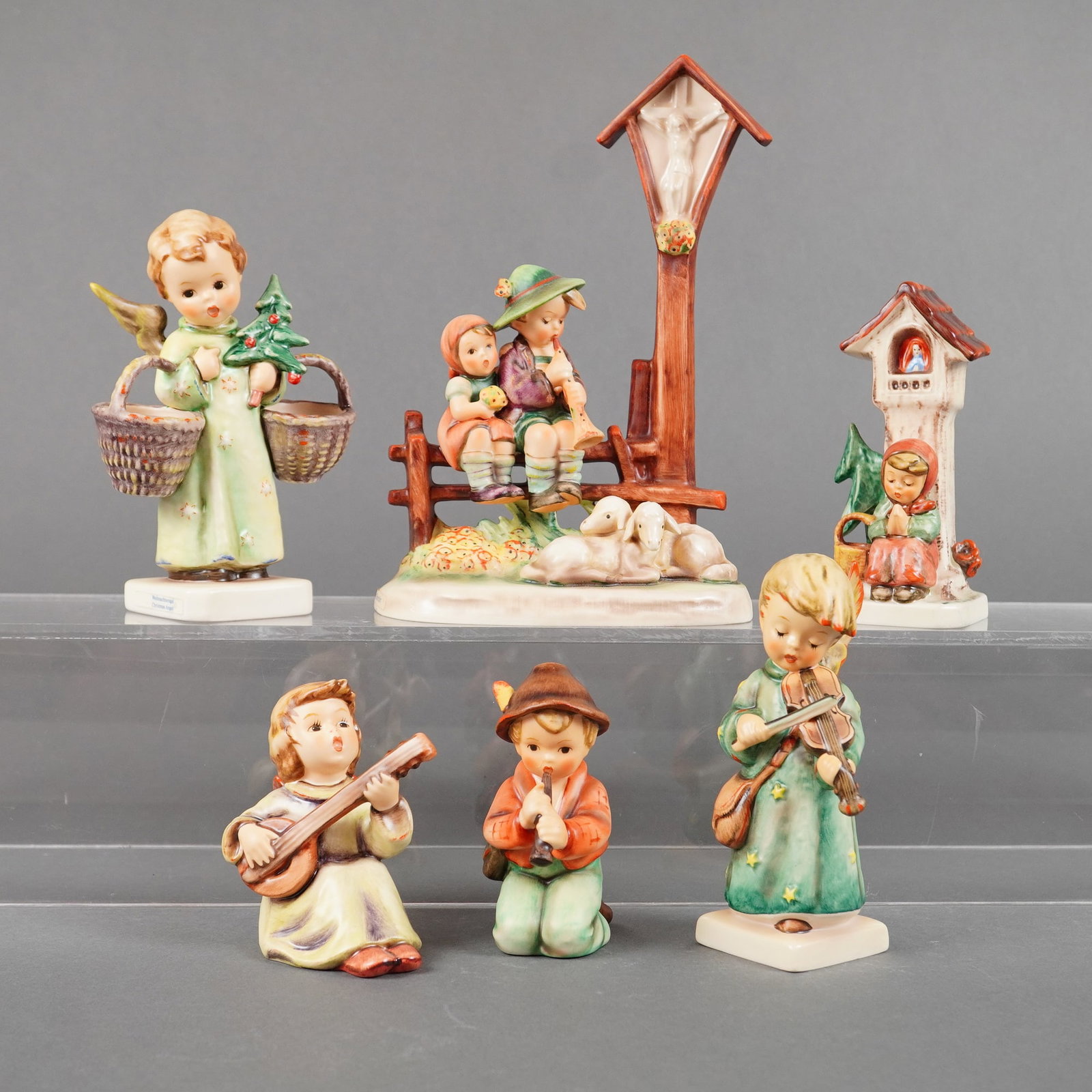 A Collection of Six Goebel Hummel Figurines including Wayside Devotion (1 of 3)