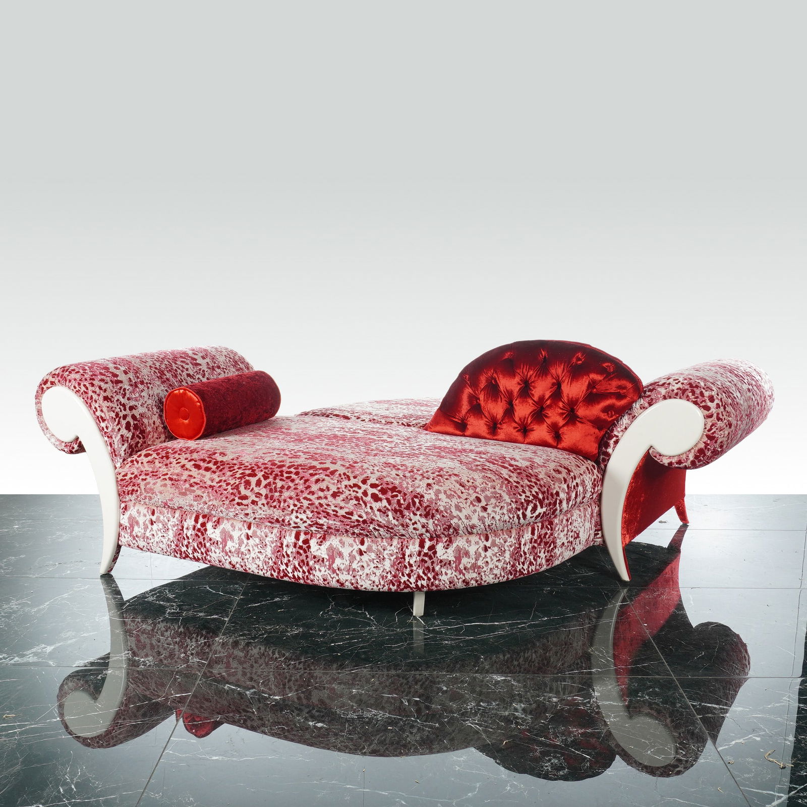 Neo Baroque Double Sided Chaise Longue Leopard Print Velvet: This contemporary double sided chaise longue is designed in a Neo-Baroque style and features a wide, asymmetrical frame. The primary upholstery consists of a textured red and off-white patterned fabri