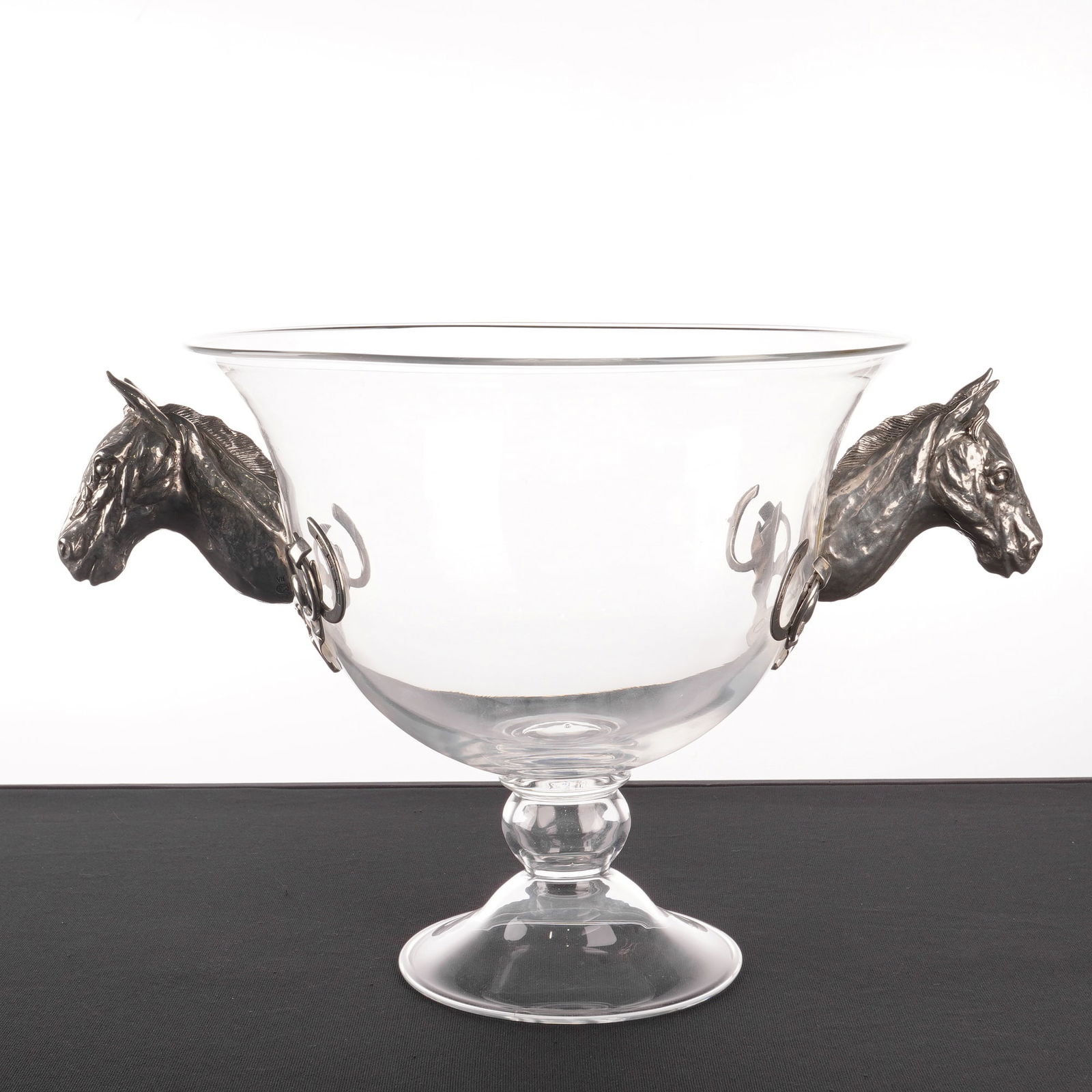 Vagabond House Equestrian Horse Head Italian Glass Ice Tub: This Vagabond House equestrian-themed vessel is designed for use as an ice tub, champagne bucket, or punch bowl. The piece features a flared, trumpet-shaped body of clear Italian glass resting on a st