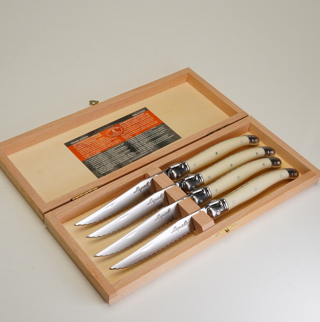 Laguiole Jean Dubost French 4pc Stainless Steel Knife Set: This kitchen set is of French manufacture and features stainless steel construction throughout the handles and blades. The lot is accompanied by a certificate of authenticity which is attached to the