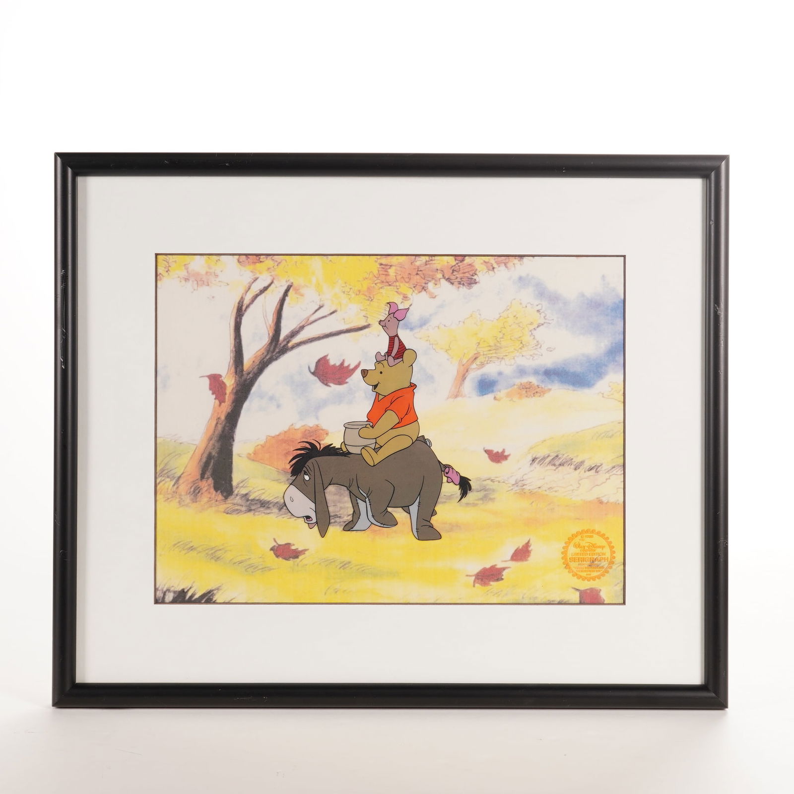 Walt Disney Company Limited Edition Serigraph, Winnie the Pooh: A Walt Disney Company limited edition serigraph depicting characters from the 1968 production Winnie the Pooh and the Blustery Day. The scene features Piglet perched on the head of Winnie the Pooh,