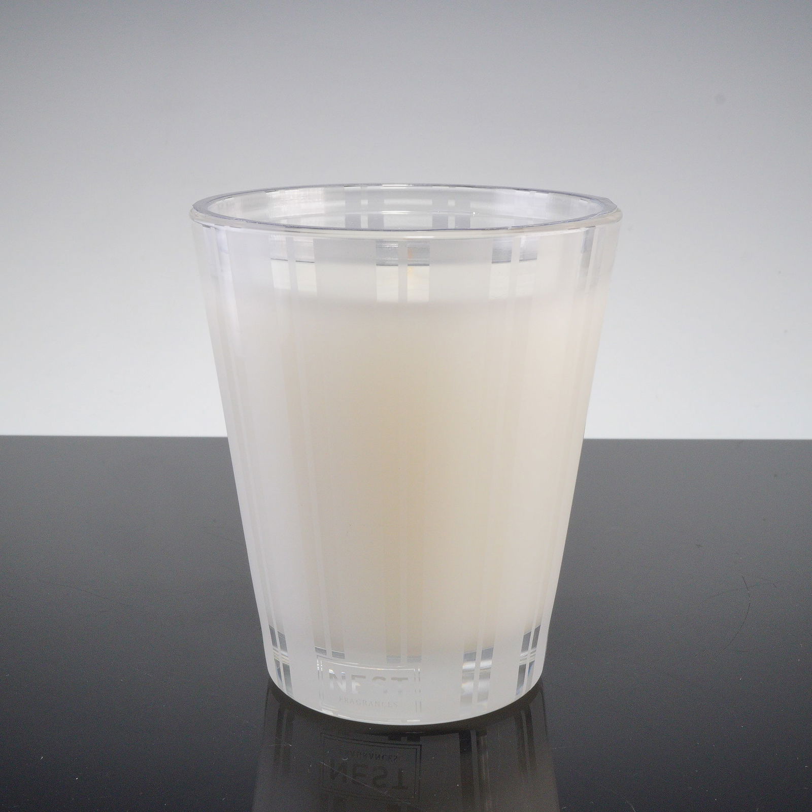 Nest Fragrances Bamboo Scented Candle, Lemongrass Ginger: Experience the vibrant, refreshing scent of Lemongrass & Ginger with this Nest Fragrances Bamboo candle. Made with premium wax and the finest fragrance oils, it delivers a clean, invigorating aroma wh