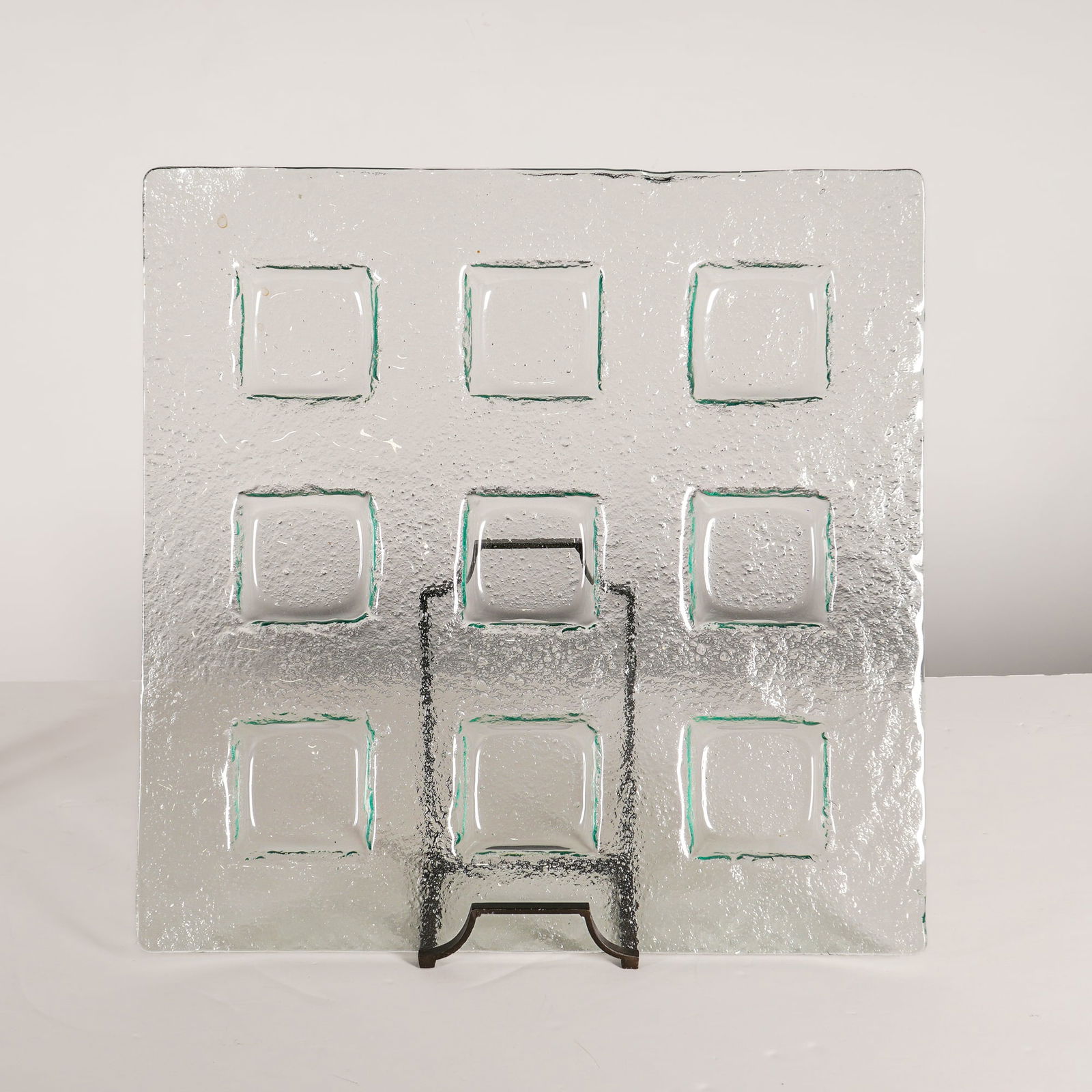 Textured Glass Serving Tray w/ Nine Square Pocket Compartments: This clear textured glass serving pocket tray with nine built-in compartments is crafted from thick, slumped glass featuring a bubbly appearance throughout its composition. The tray is designed with