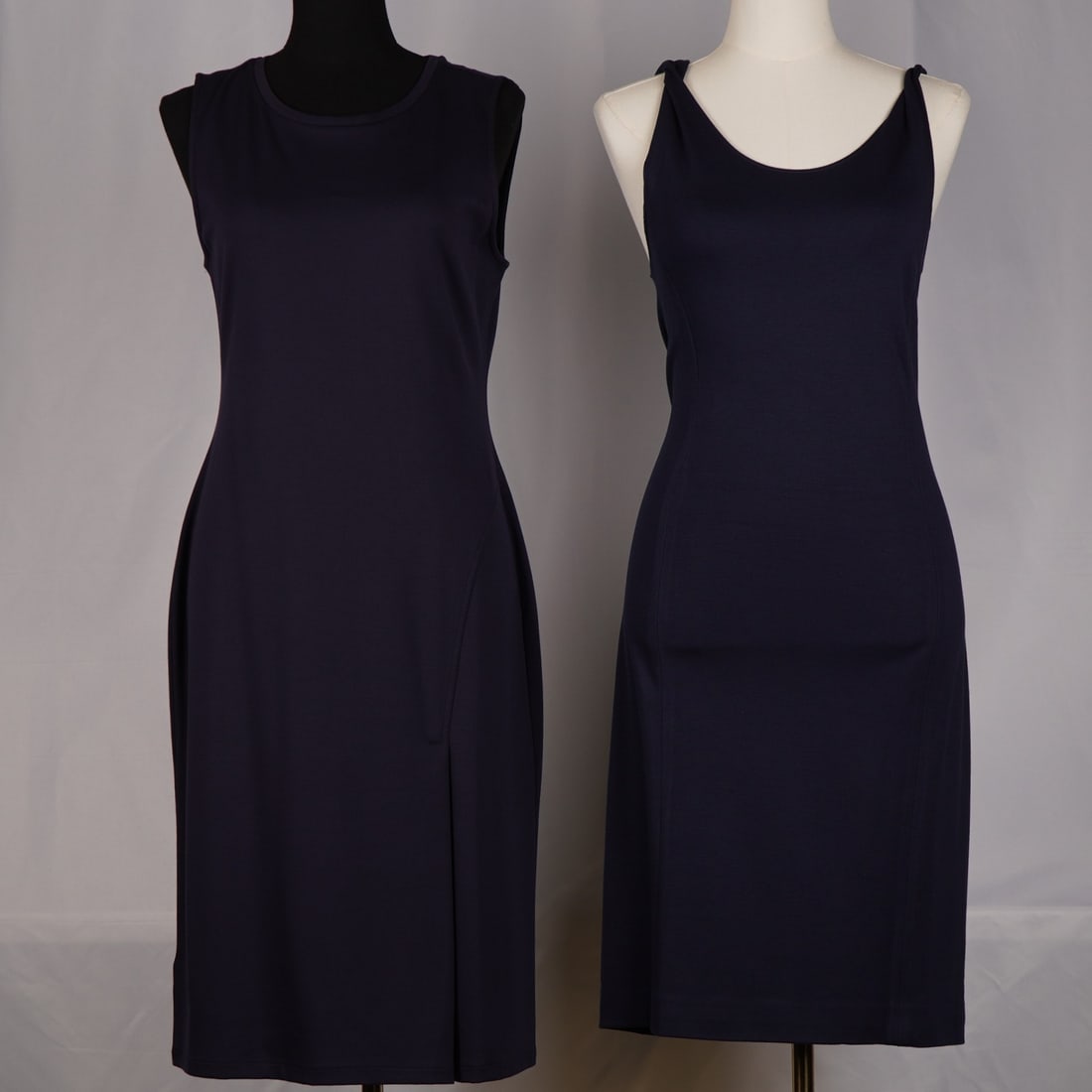 2pc Sleeveless Navy Dresses, Tahari and Ann Taylor: This listing includes two navy sleeveless dresses, both in size M. Each dress is made from a smooth knit fabric with a simple silhouette and a knee-length cut. The Ann Taylor dress features a round