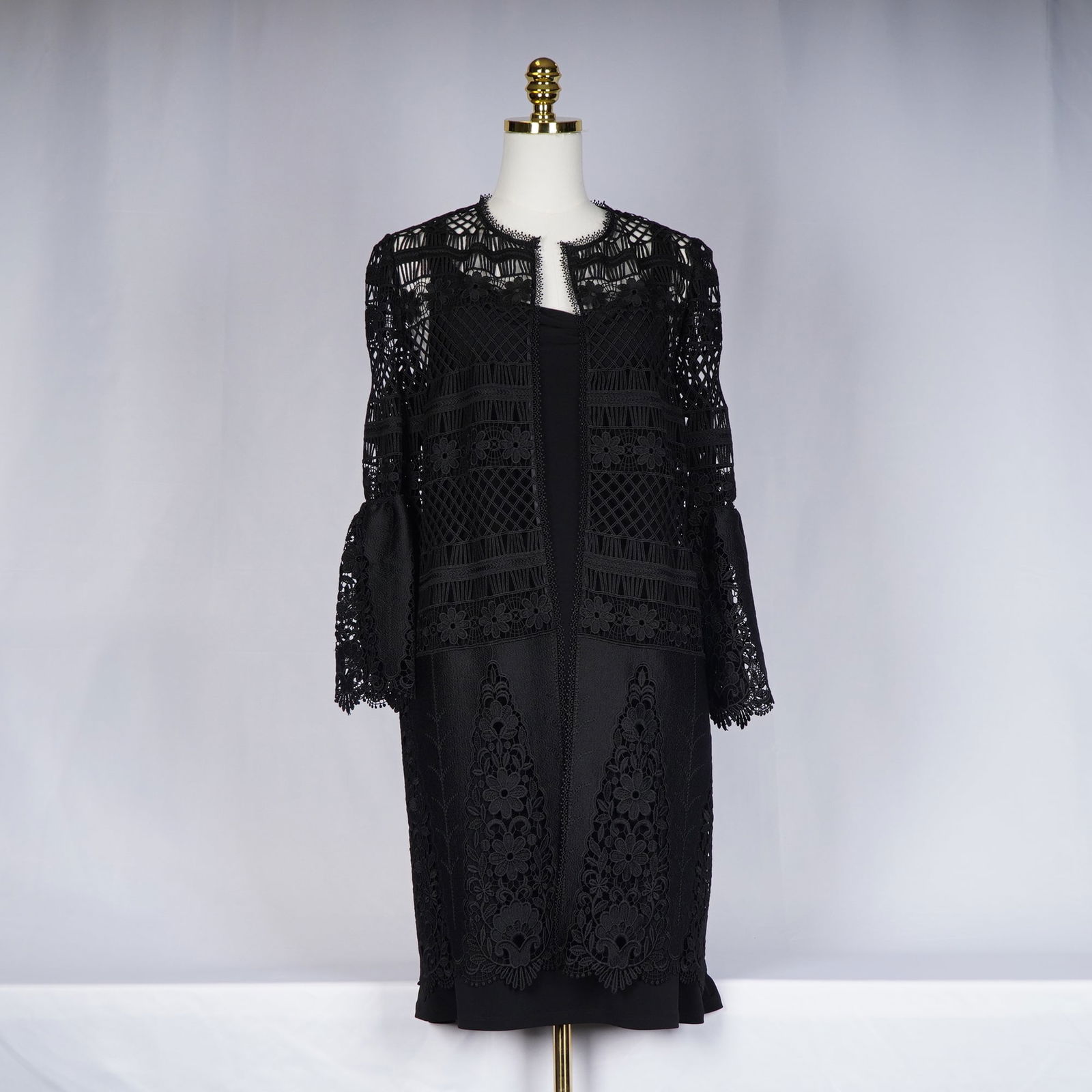 2pc Michael Kors Black Dress with Elie Tahari Lace Jacket: This outfit includes a Michael Kors black sleeveless dress in a medium size. The dress has a simple silhouette with a soft draped neckline and ribbon-trimmed straps. Paired with it is an Elie Tahari
