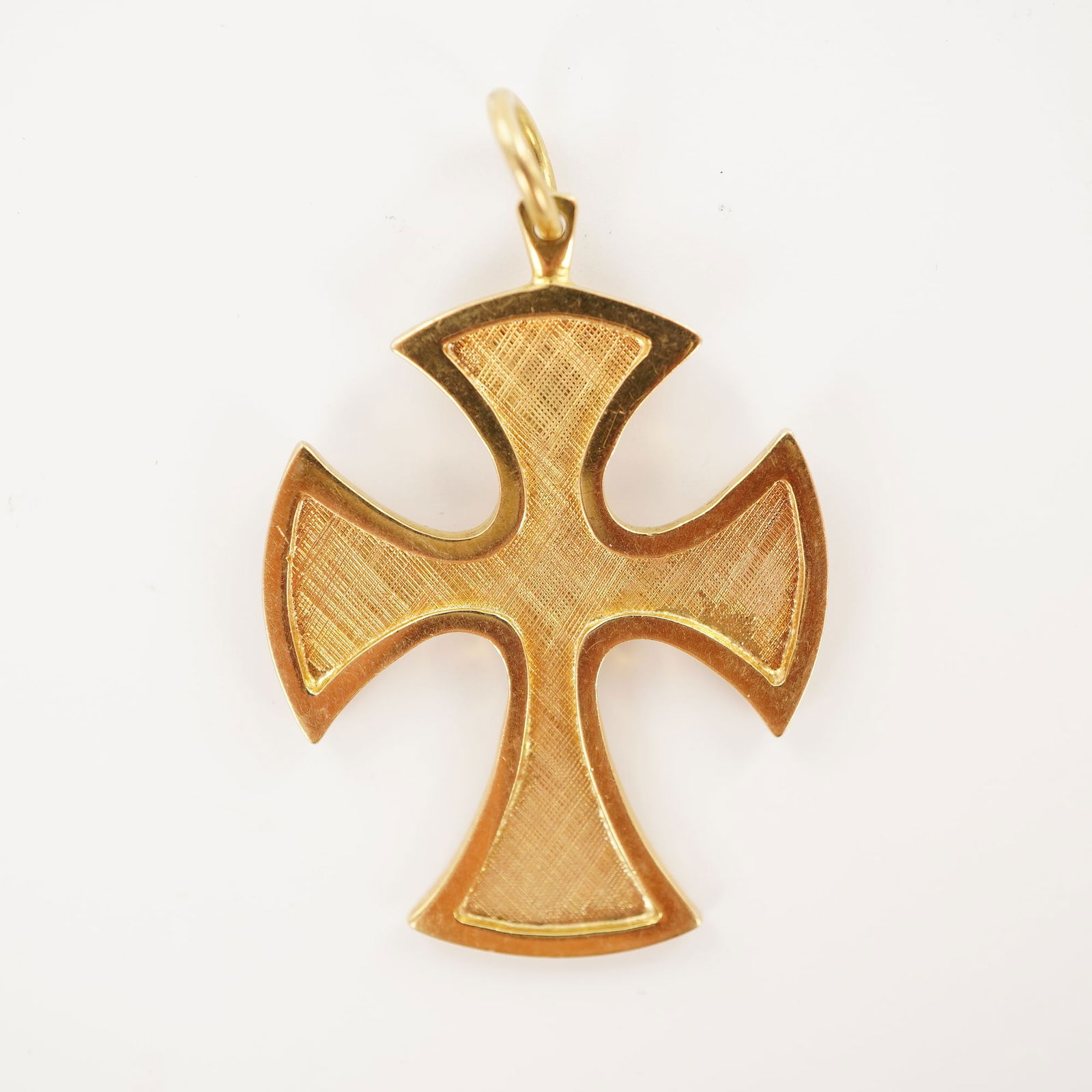 14K Gold Maltese Cross Pendant: Formed as a cross with recessed textured panels and polished raised borders. The reverse is plain and smooth with a suspension bail. Weight: 8 g. Dimensions: 1.25"W x 1.75"H