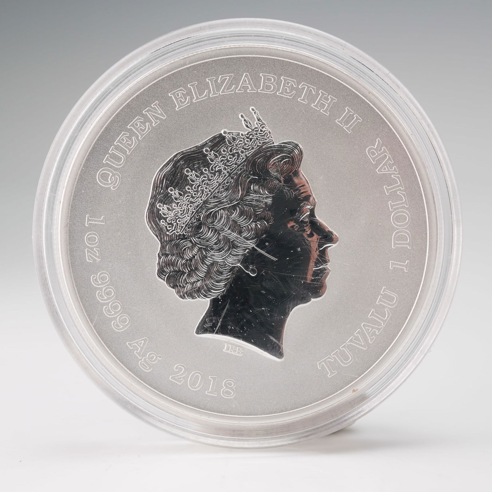 2018 Elizabeth II Thor Silver Dollar: Struck from one troy ounce of .9999 fine silver, this coin was issued by the Perth Mint for Tuvalu. The obverse features the effigy of Queen Elizabeth II, with inscriptions reading QUEEN ELIZABETH II,