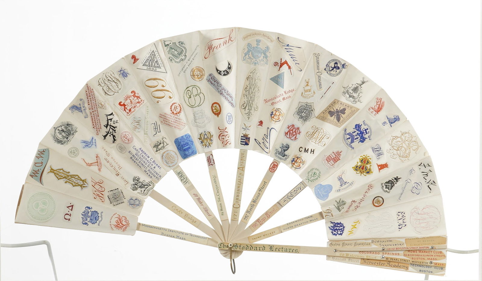 Antique Folk Art Fan from the Boston Area, circa 1900: This album fan from the Boston area, circa 1900, is a regional folk art piece that has been used as a scrapbook. The double-sided paper leaf is decorated with an extensive collection of pasted-on clip