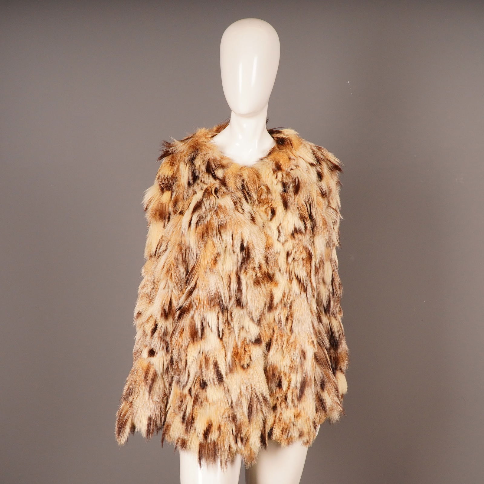 Patchin FURS Vintage Fox Fur Patchwork Vest: A vintage sleeveless garment by Patchin FURS, Pennsauken, N. J., styled as a short jacket or vest. The exterior features long-haired fur, identified through market consensus as sectioned or patchwork