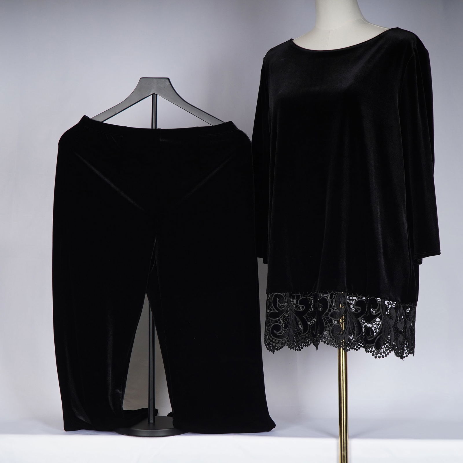 2pc Chico's Outfit, Black Velvet: This listing includes a two-piece Chico's Travelers outfit in black velvet. The set features a long-sleeve tunic top with a cutwork lace hem and a pair of straight-leg pull-on pants with an elastic