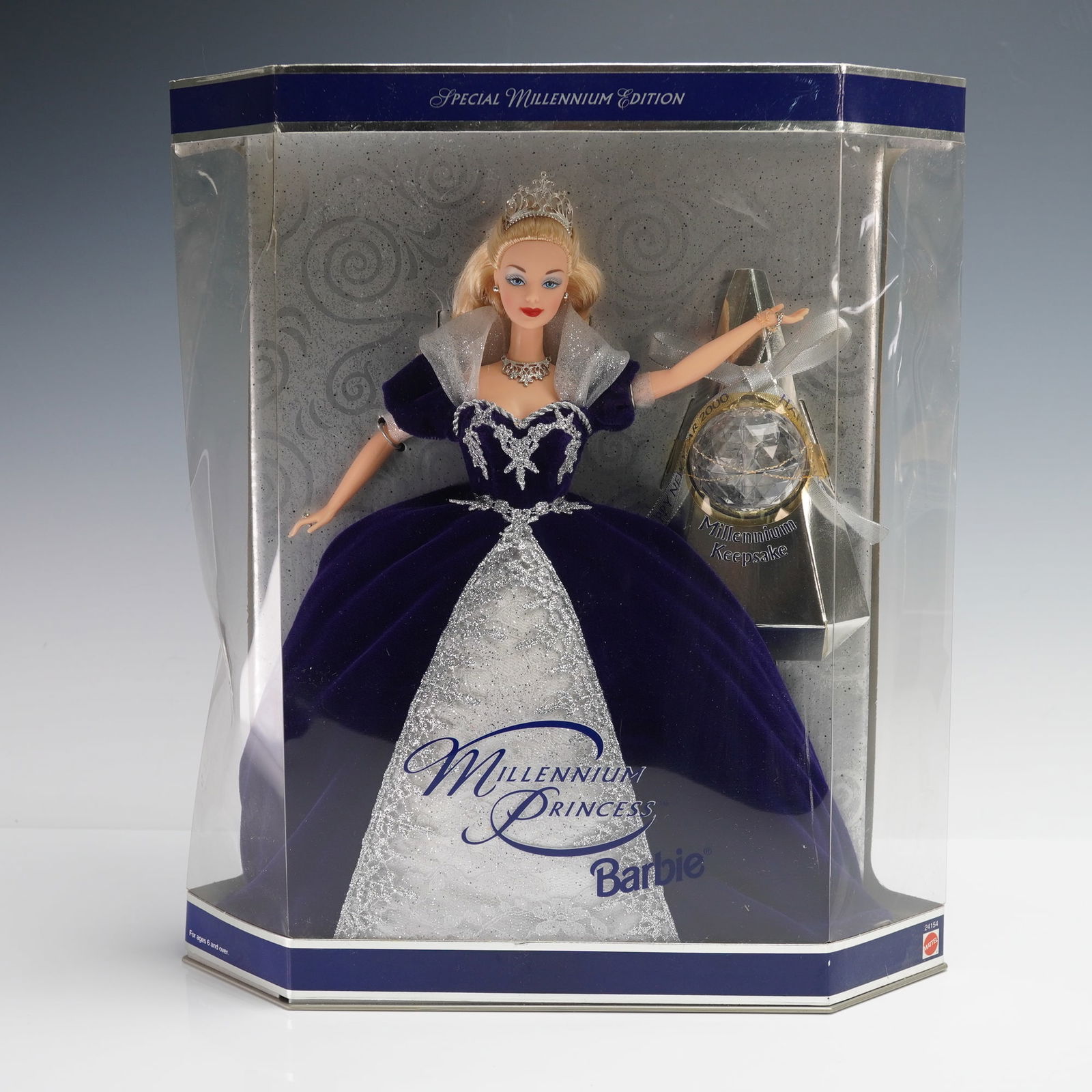 Millennium Princess Barbie Doll Holiday Special Edition: This 1999 Mattel Millennium Princess Barbie doll (UPC 074299241543) is a special edition released to commemorate the turn of the millennium. The doll is dressed in an elegant midnight blue velvet