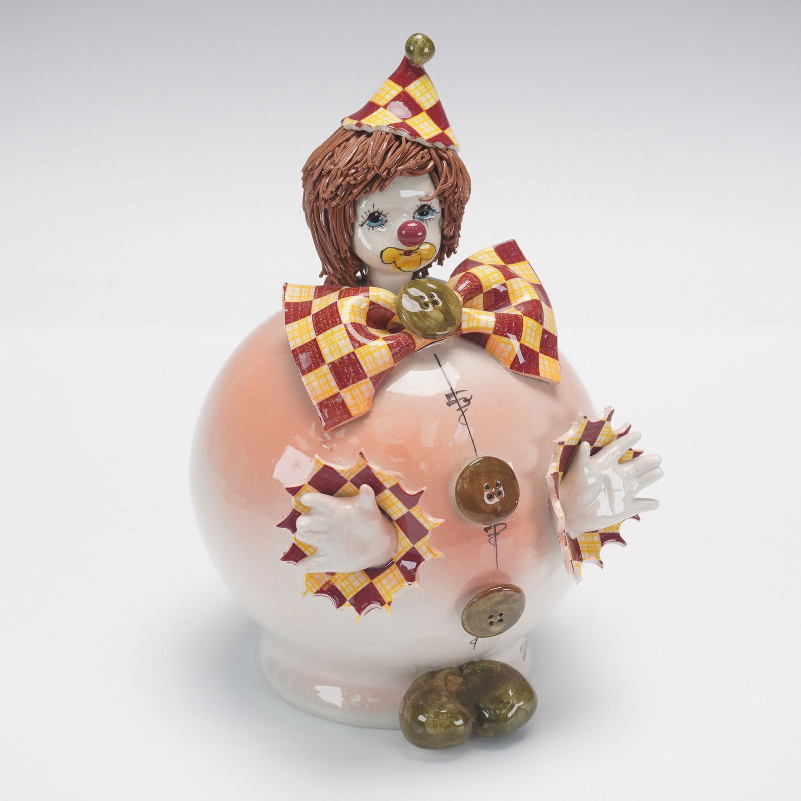 Zampiva Italian Ceramic Clown Sculpture: Whimsical and expertly hand-crafted, this ceramic sculpture by Italian artist Zampiva features a jovial clown figure with an exaggeratedly round body and cheerful details. The clown's attire is