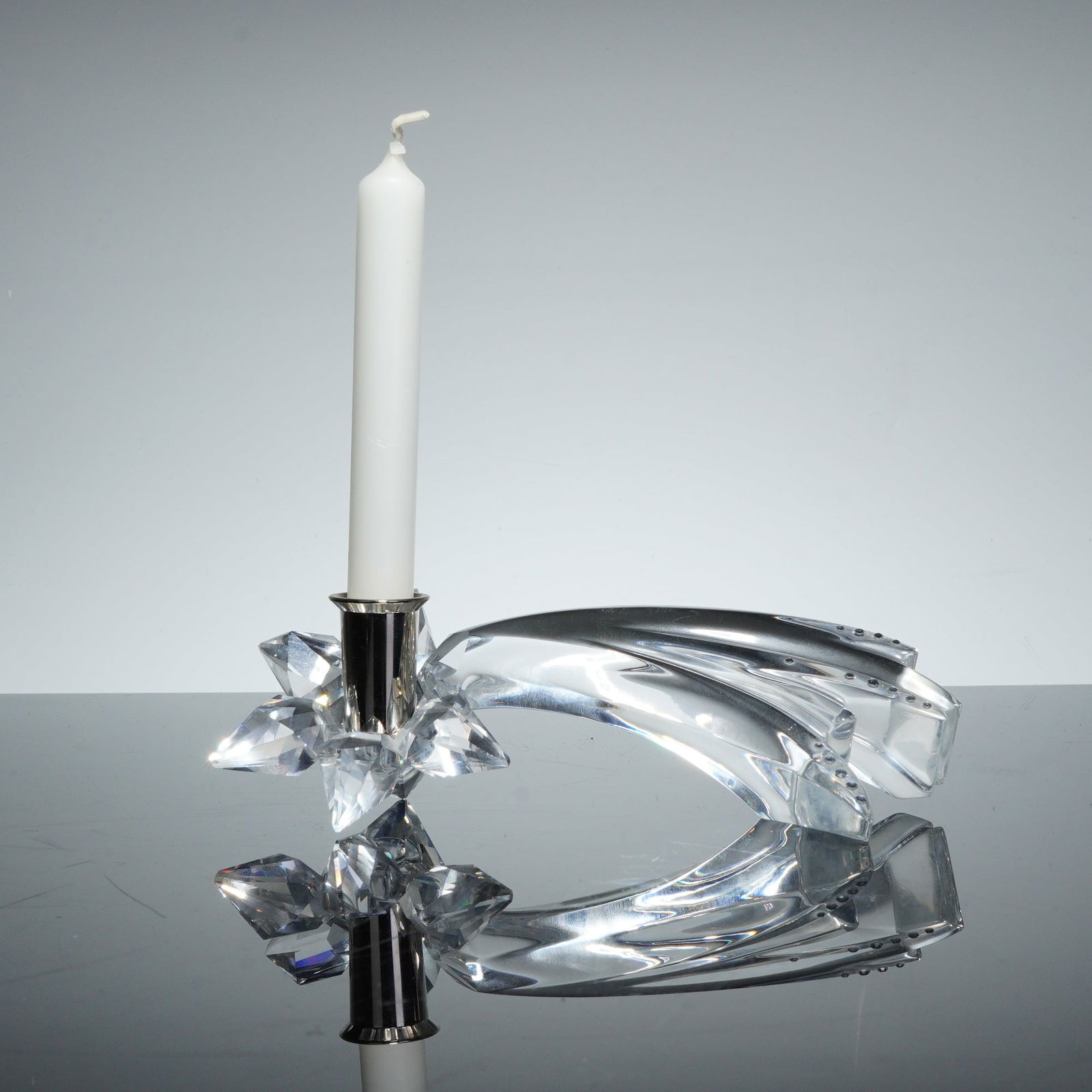 Swarovski Silver Crystal Comet Shooting Star Candle Holder: Swarovski Silver Crystal Comet candle holder, model number 236716, designed by Martin Zendron. The piece is constructed from clear, multifaceted lead crystal and features a silver-toned metal candle