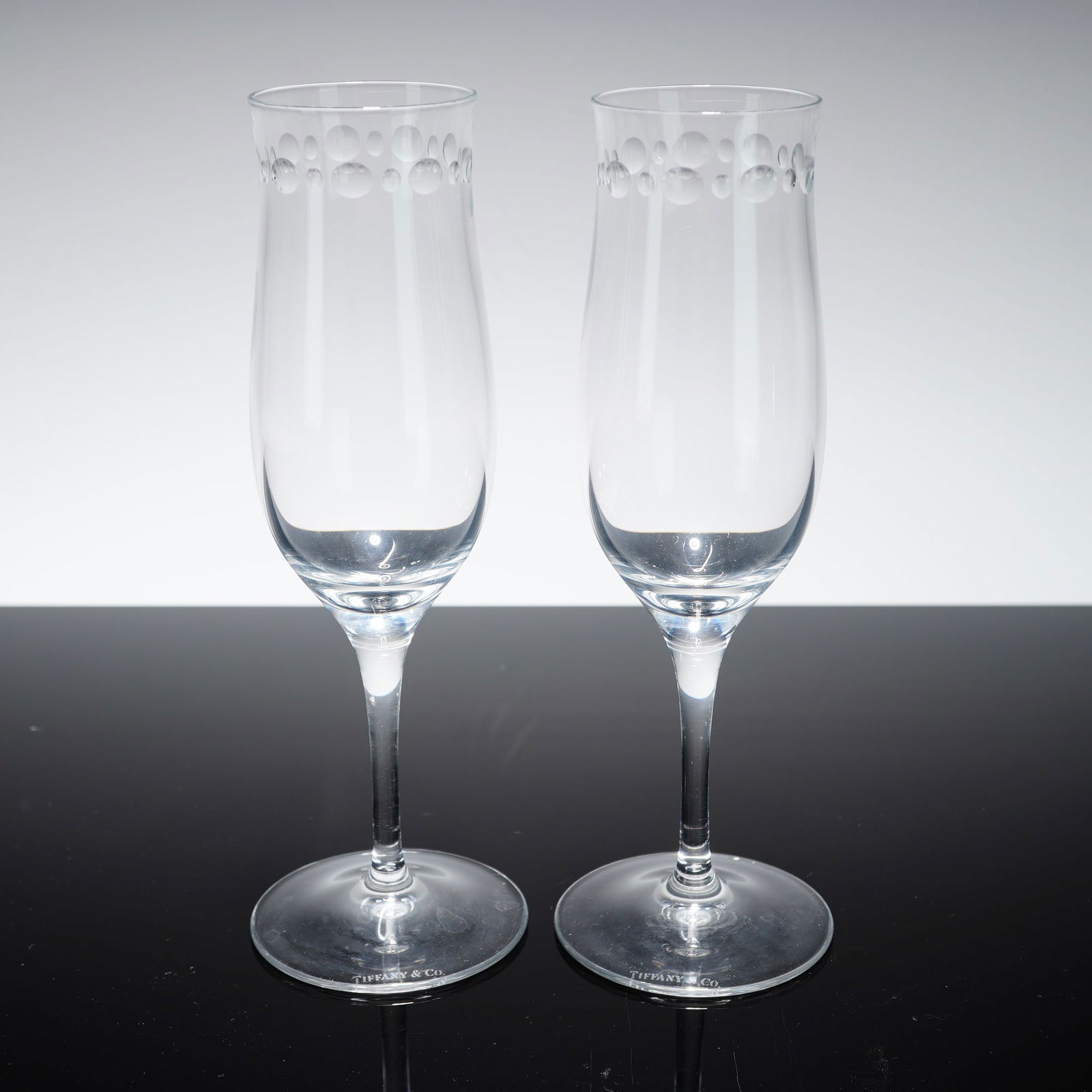 A Pair of Tiffany & Co. Crystal Champagne Flutes in the Bubbles Pattern (1 of 4)