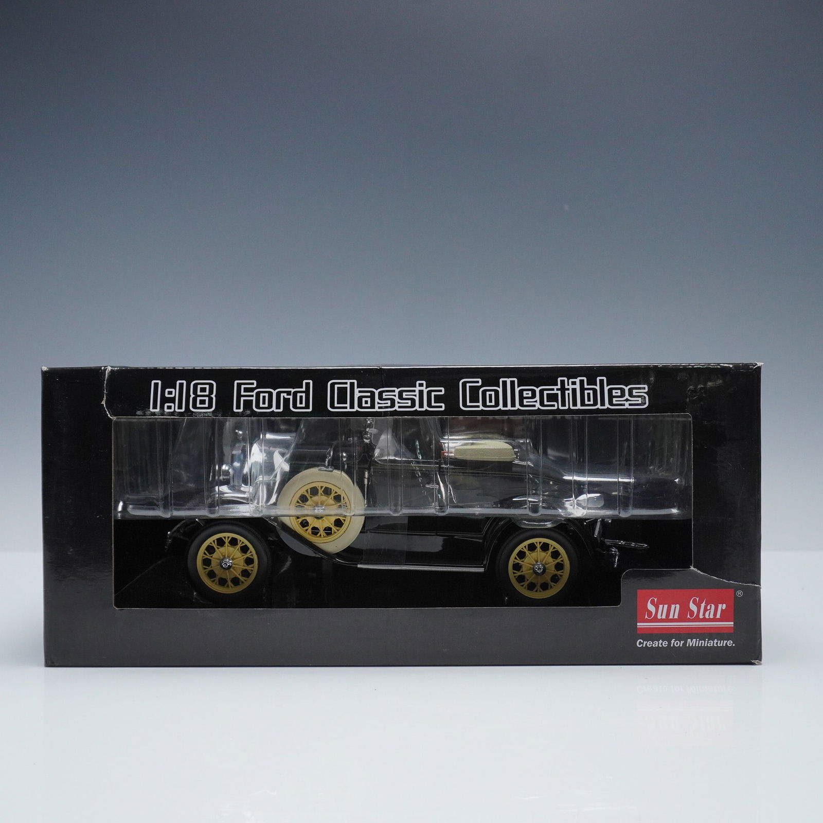 Sun Star 1:18 Die-Cast Model, 1931 Ford Model A Roadster: Highly detailed 1:18 scale die-cast model of the 1931 Ford Model A Roadster by Sun Star Models Development Ltd. Features include an accurate vintage body style with chrome accents, whitewall wheels, a