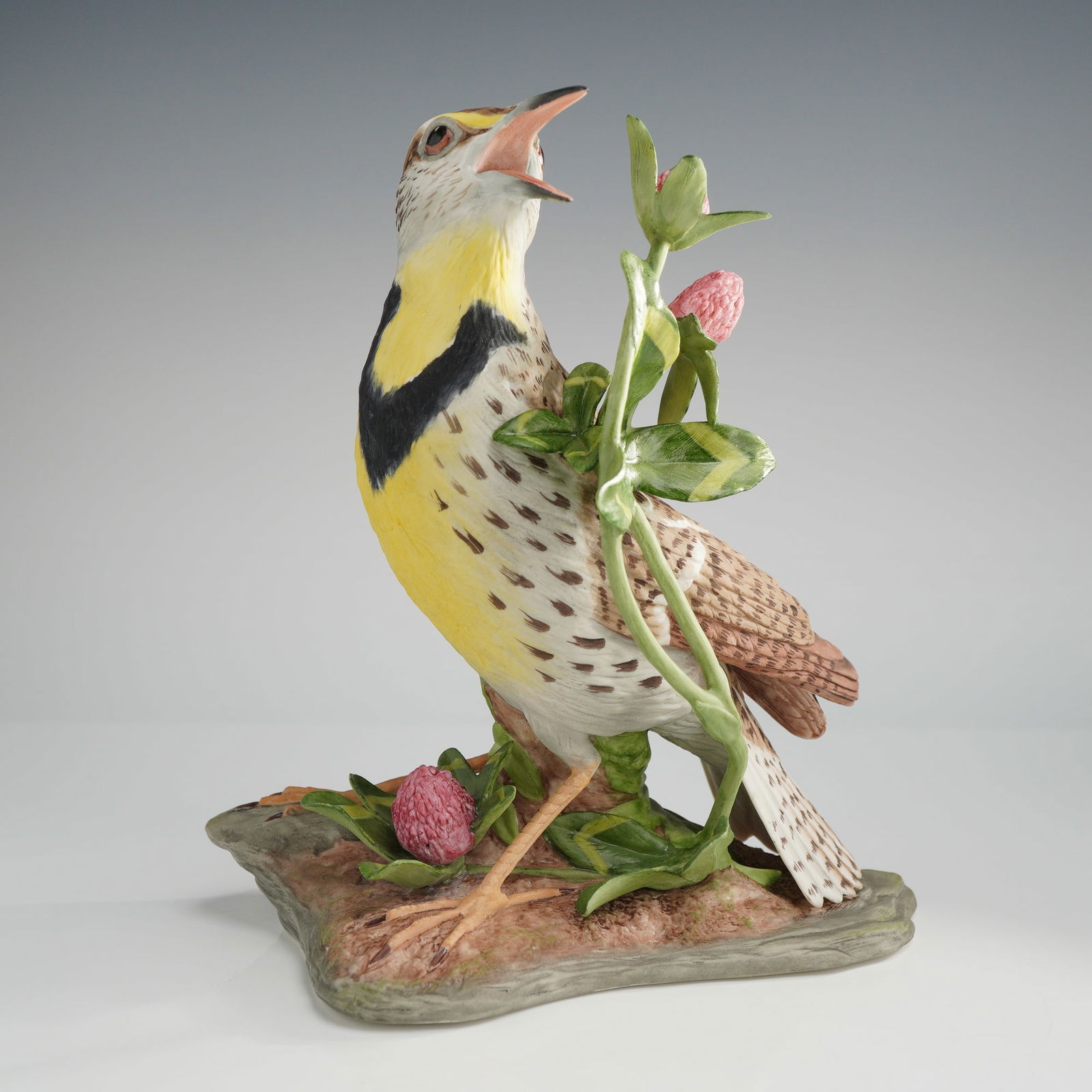 Boehm Porcelain Figurine, Eastern Meadowlark 435: An Edward Marshall Boehm polychrome enamel decorated bisque porcelain figurine of an Eastern Meadowlark, model number 435. Produced by the Boehm Porcelain Company of Trenton, New Jersey, circa 1965. T