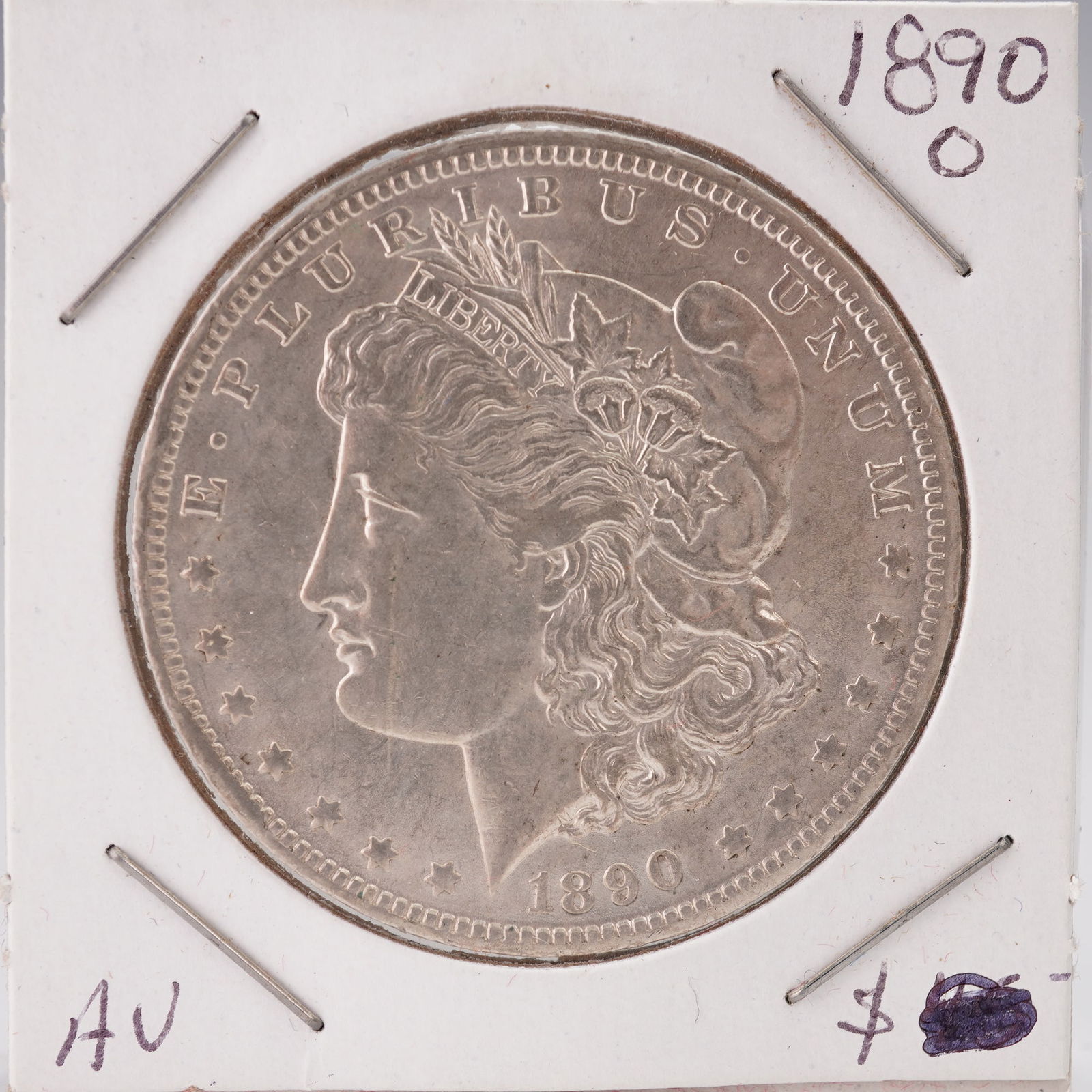1890-O United States Morgan Silver Dollar: The Morgan dollar is a United States silver dollar minted from 1878 to 1904 and again in 1921. It was the first standard silver dollar produced after the Coinage Act of 1873 and contains 412.5 Troy