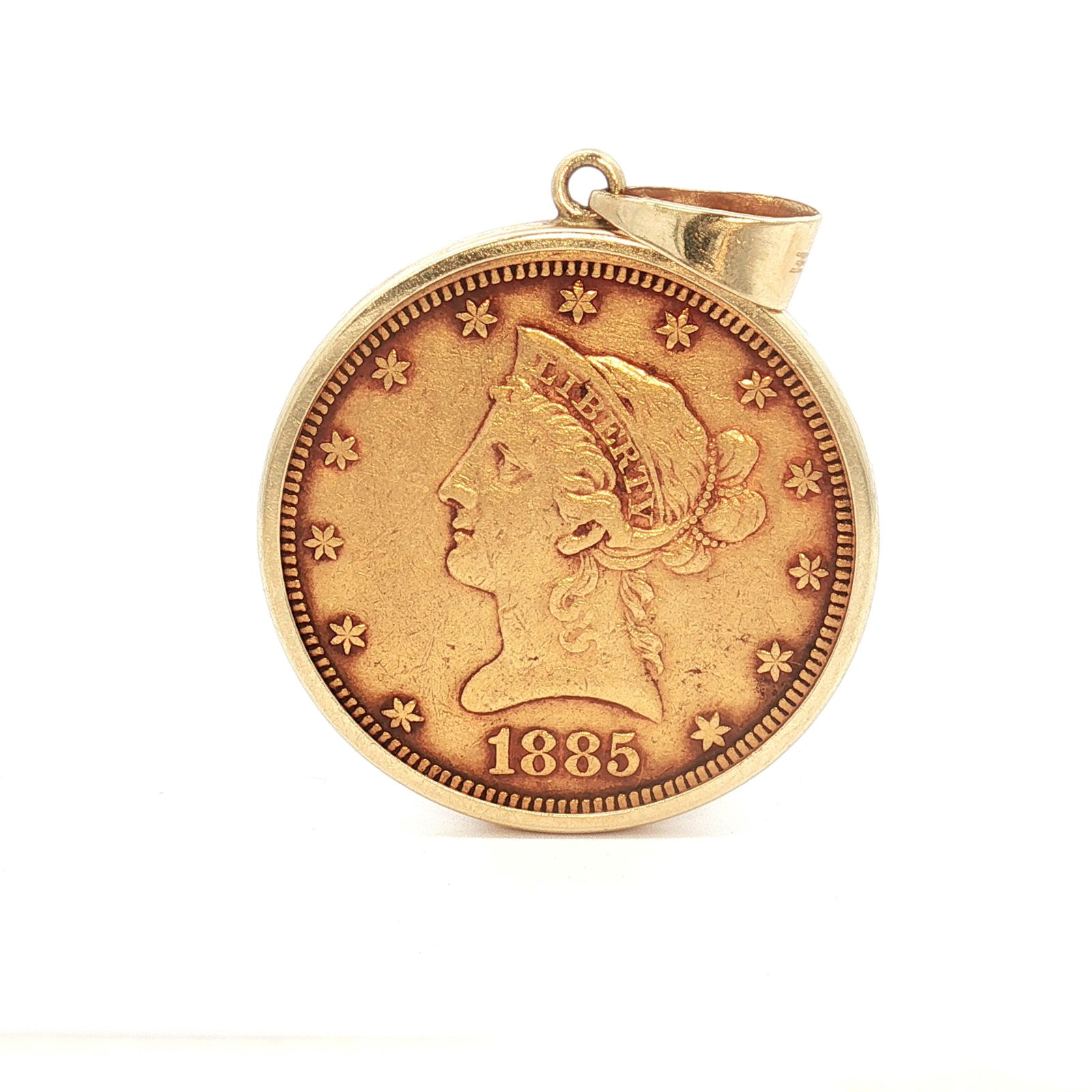 1885 US $10 Liberty Head Gold Coin in 14K Bezel: The obverse features the coronet head of Liberty facing left, encircled by 13 stars, with the date below. The reverse shows a heraldic eagle with a Union shield, holding three arrows and an olive