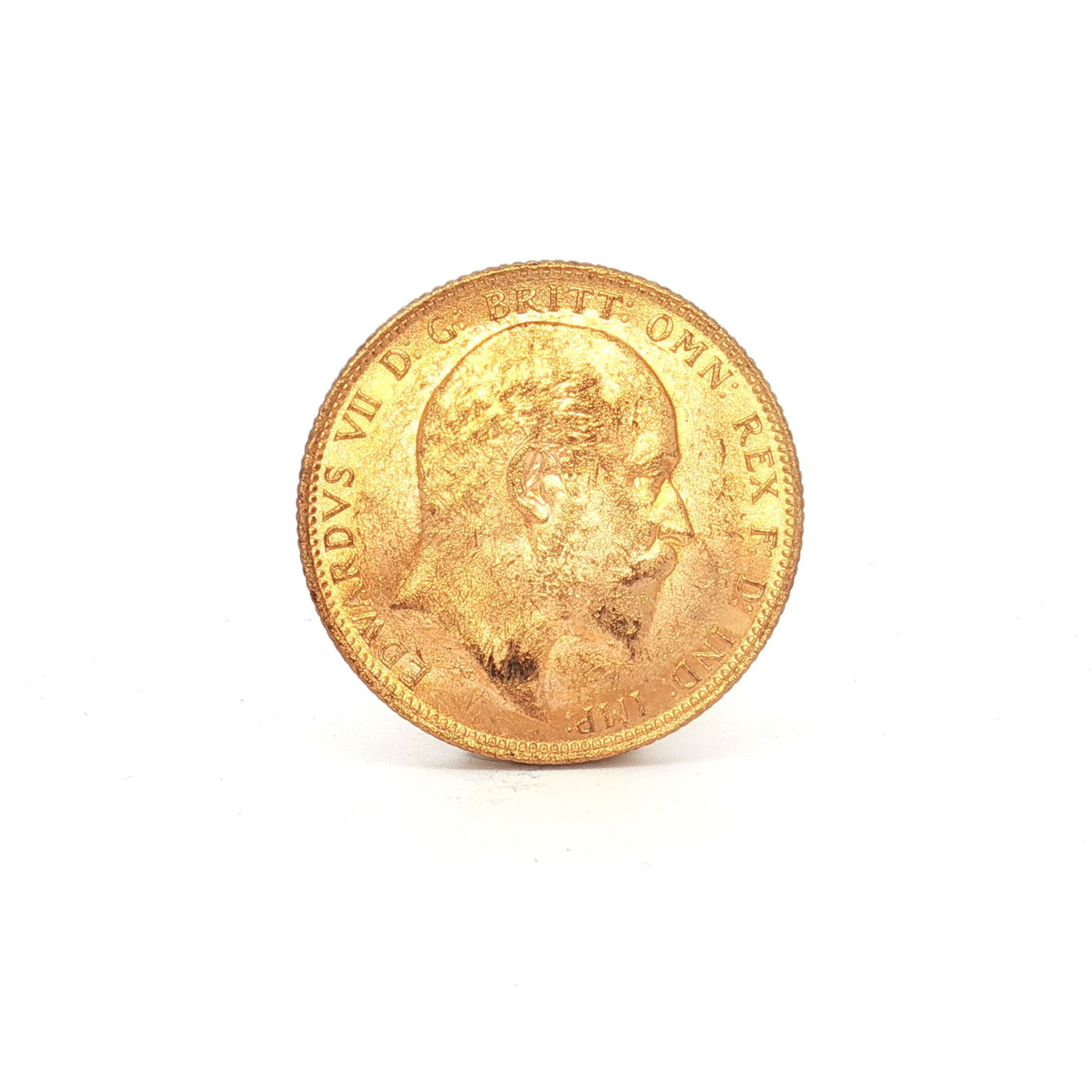 1905 UK 1 Sovereign King Edward VII Gold Coin: 1905 UK 1 Sovereign Edward VII Gold Coin, produced by the Royal Mint. The obverse features an uncrowned portrait of King Edward VII facing right, surrounded by a legend. The reverse shows St. George