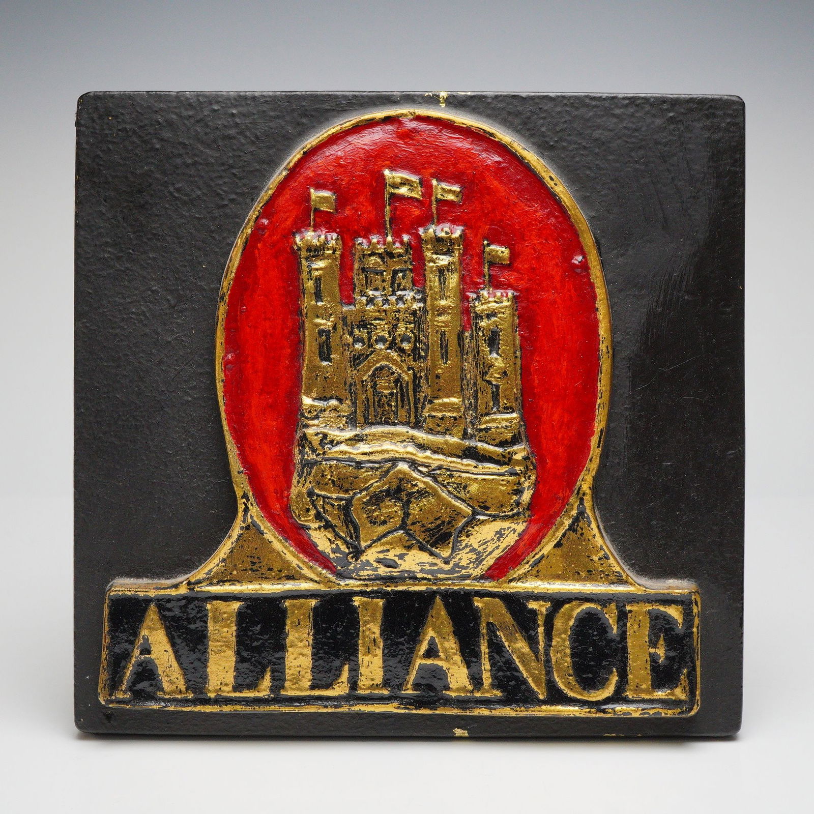 Alliance Insurance Company by E. V. Jackson Reproduction Fire Mark Plaque: This cast plaque features the fortress emblem of the Alliance Insurance Company, shown within an oval field above the raised name ALLIANCE. A typed label on the reverse notes the firm's establishment