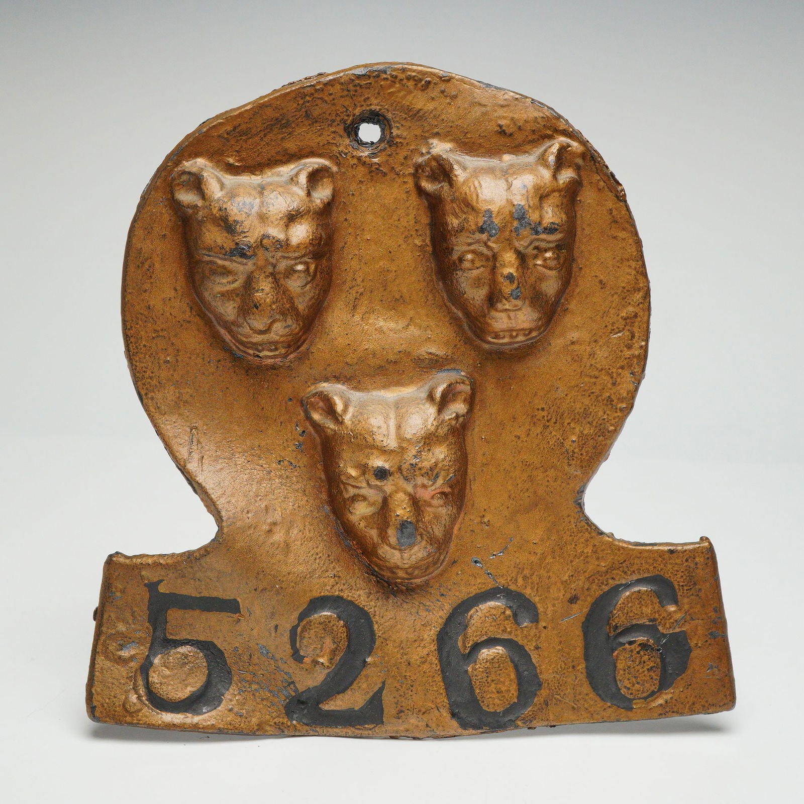 Shropshire Fire Office Cast Metal Three Leopard Heads Fire Mark Plaque: This cast metal wall plaque is a later fire mark style piece based on the historic Shropshire Fire Office design used in the nineteenth century, featuring the classic three leopard heads arranged abov