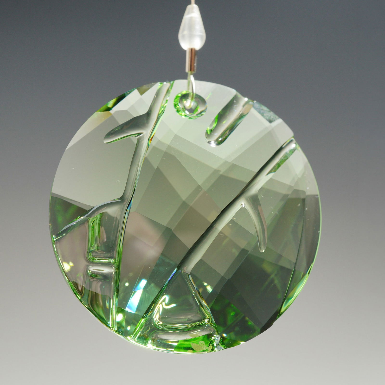Swarovski Crystal SCS 2008 Bamboo Window Sun Catcher Earth Ornament: A Swarovski Crystal Society SCS faceted green crystal window sun catcher ornament from the Earth collection, identified as the 2008 Bamboo design. The piece is constructed as a faceted green crystal d