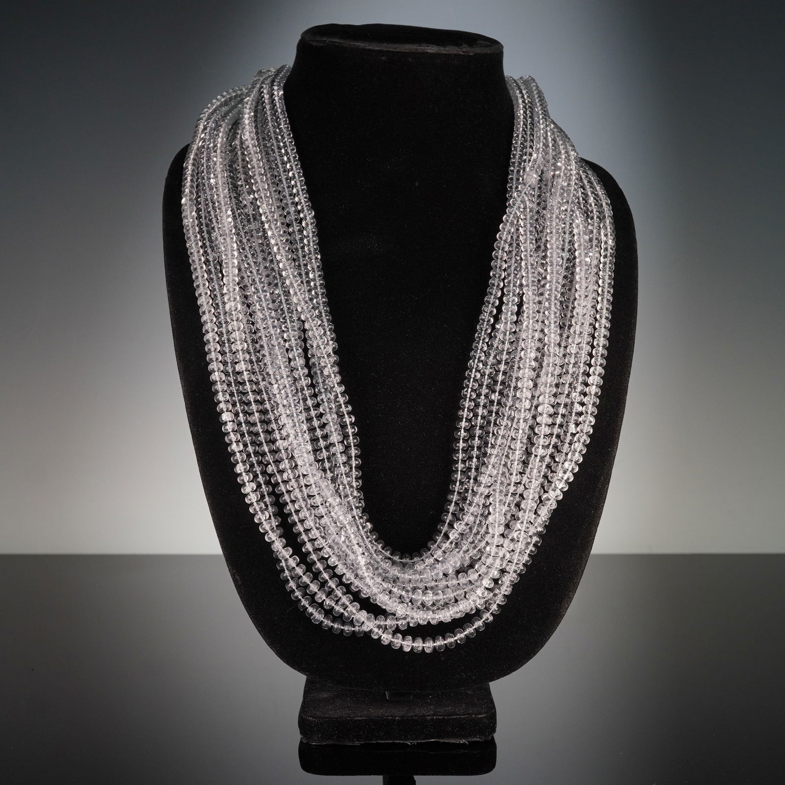 Emporio Armani Multi-Strand Faceted Rock Crystal Quartz Bead Necklace: A multi-strand designer necklace attributed to Emporio Armani. The piece is constructed from numerous strands of small, clear, colorless, faceted spherical beads, consistent with natural rock crystal