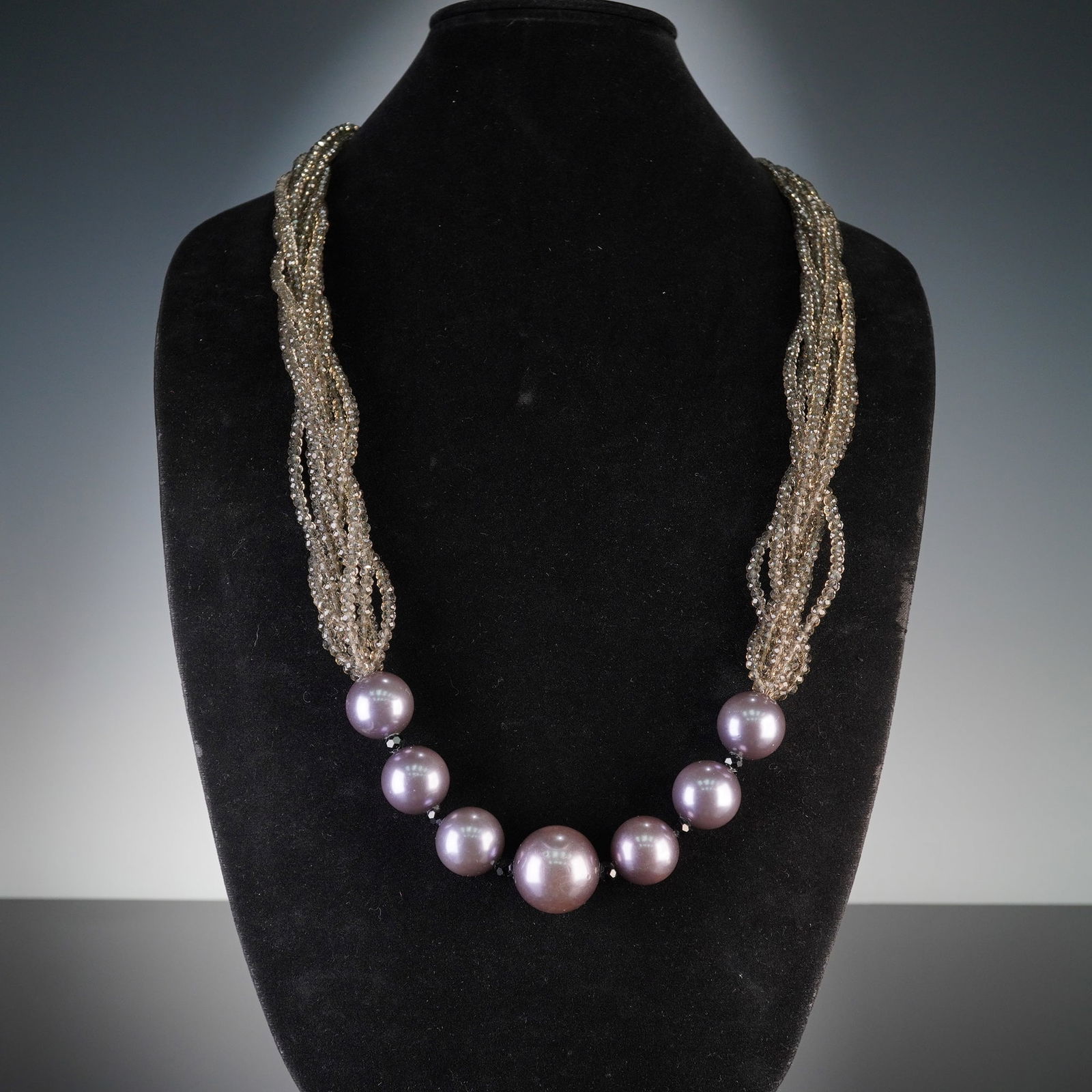 WEEKEND MaxMara Multi-Strand Beaded Necklace: A WEEKEND MaxMara multi-strand fashion necklace, featuring a prominent central section composed of large, spherical, lustrous purple-mauve beads. These are interspersed with two large, flat, circular,