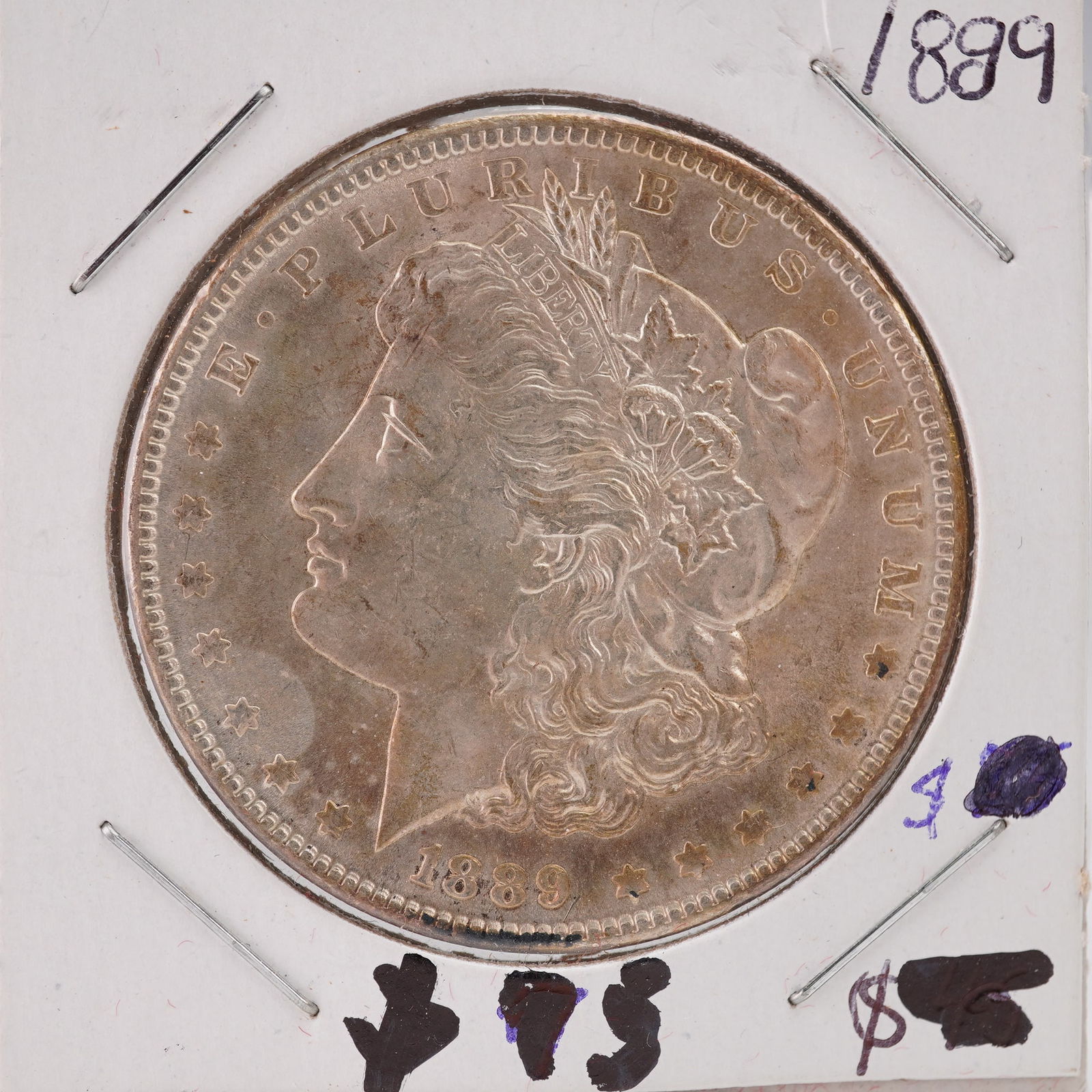 1889 United States Morgan Silver Dollar: The Morgan dollar is a United States silver dollar minted from 1878 to 1904 and again in 1921. It was the first standard silver dollar produced following the Coinage Act of 1873 and contains 412.5