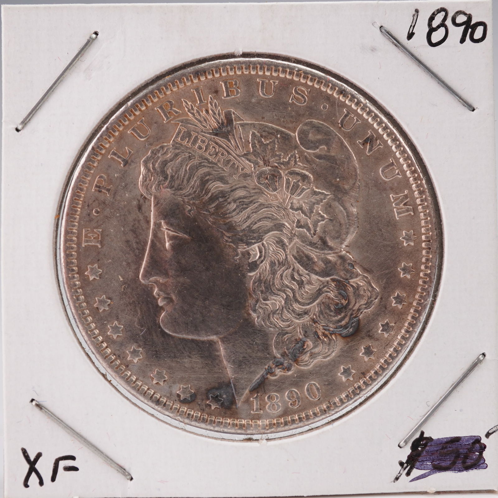 1890 United States Morgan Silver Dollar: The Morgan dollar is a United States silver dollar minted from 1878 to 1904 and again in 1921. It was the first standard silver dollar produced following the Coinage Act of 1873 and contains 412.5