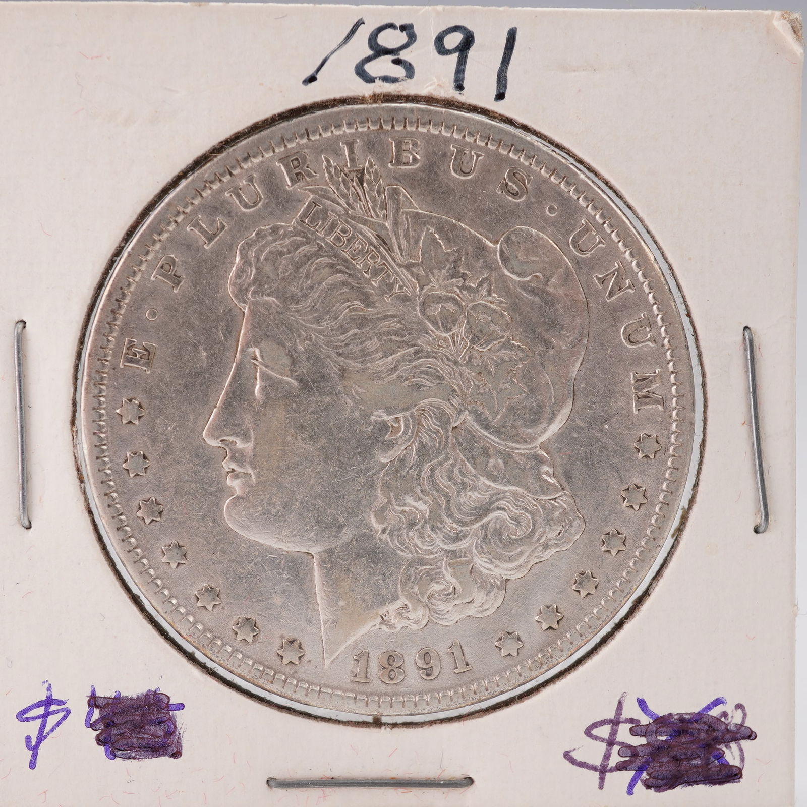 1891 United States Morgan Silver Dollar: The Morgan dollar is a United States silver dollar minted from 1878 to 1904 and again in 1921. It was the first standard silver dollar produced following the Coinage Act of 1873 and contains 412.5