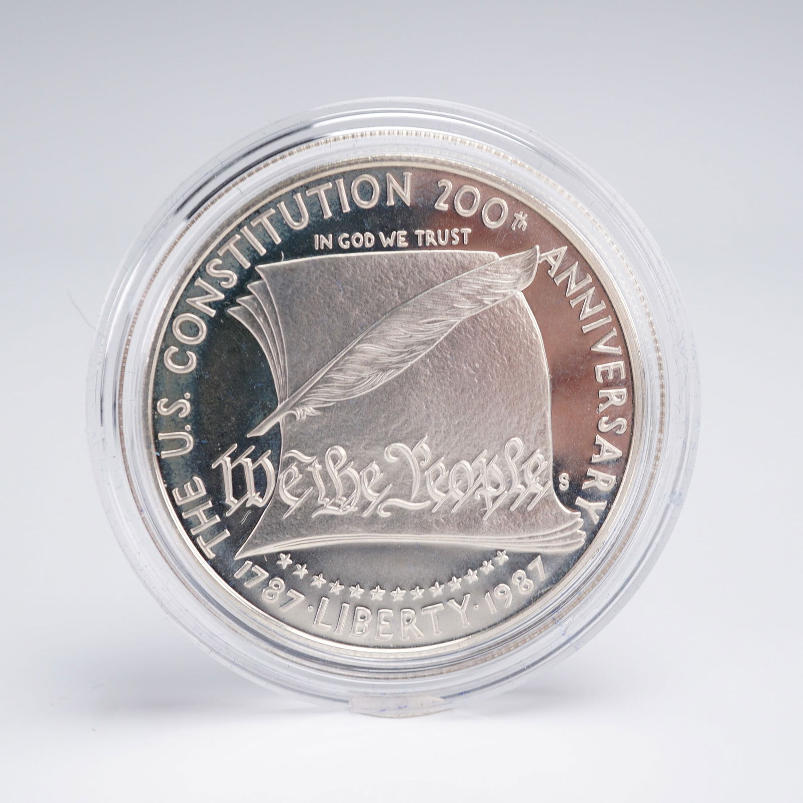 1987-S U.S. Mint Bicentennial Proof Silver Dollar: Proof silver commemorative from the San Francisco Mint, housed in the original U.S. Mint velvet presentation case with outer box. Struck in 90% silver, 10% copper; weight 26.73 g; diameter 38.10 mm; r