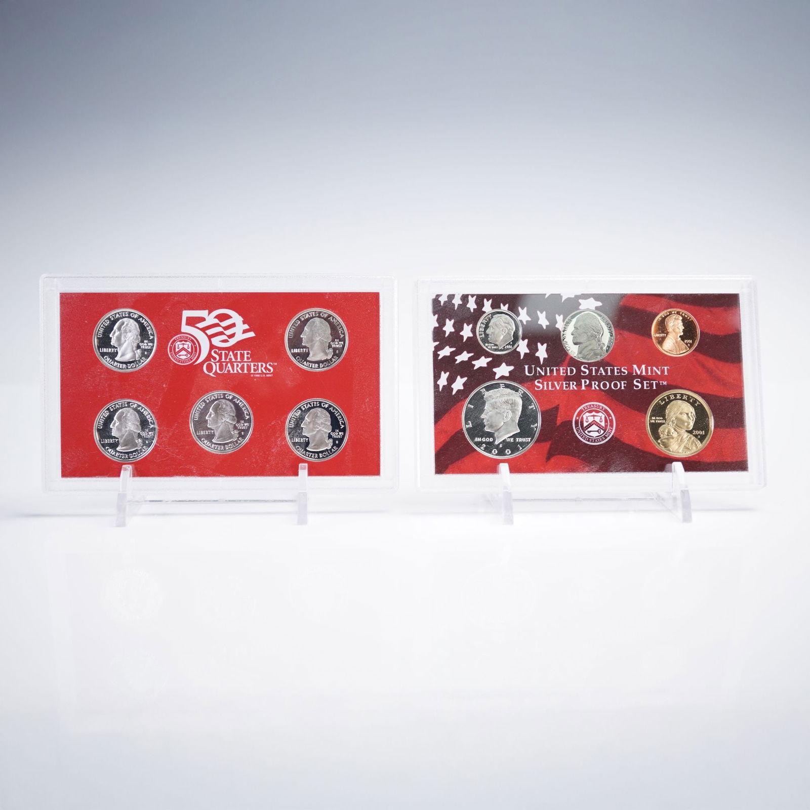 2001-S U.S. Mint Silver Proof Set (10 Coins): Complete 2001 San Francisco - minted Silver Proof issue in Original Government Packaging with COA, housed in two display lenses. The set comprises Lincoln Cent, Jefferson Nickel, Roosevelt Dime (silve