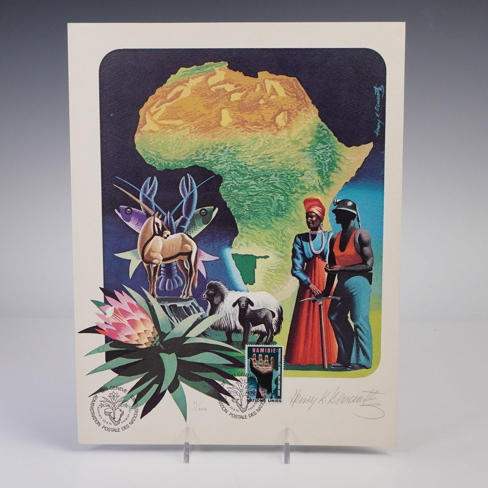 1975 United Nations Geneva First Day Cover and Limited Edition Print Signed: United Nations Geneva First Day Cover with a limited edition color print designed by artist Henry K. Benscath. Issued September 22, 1975, the work commemorates Namibia and features vibrant imagery of