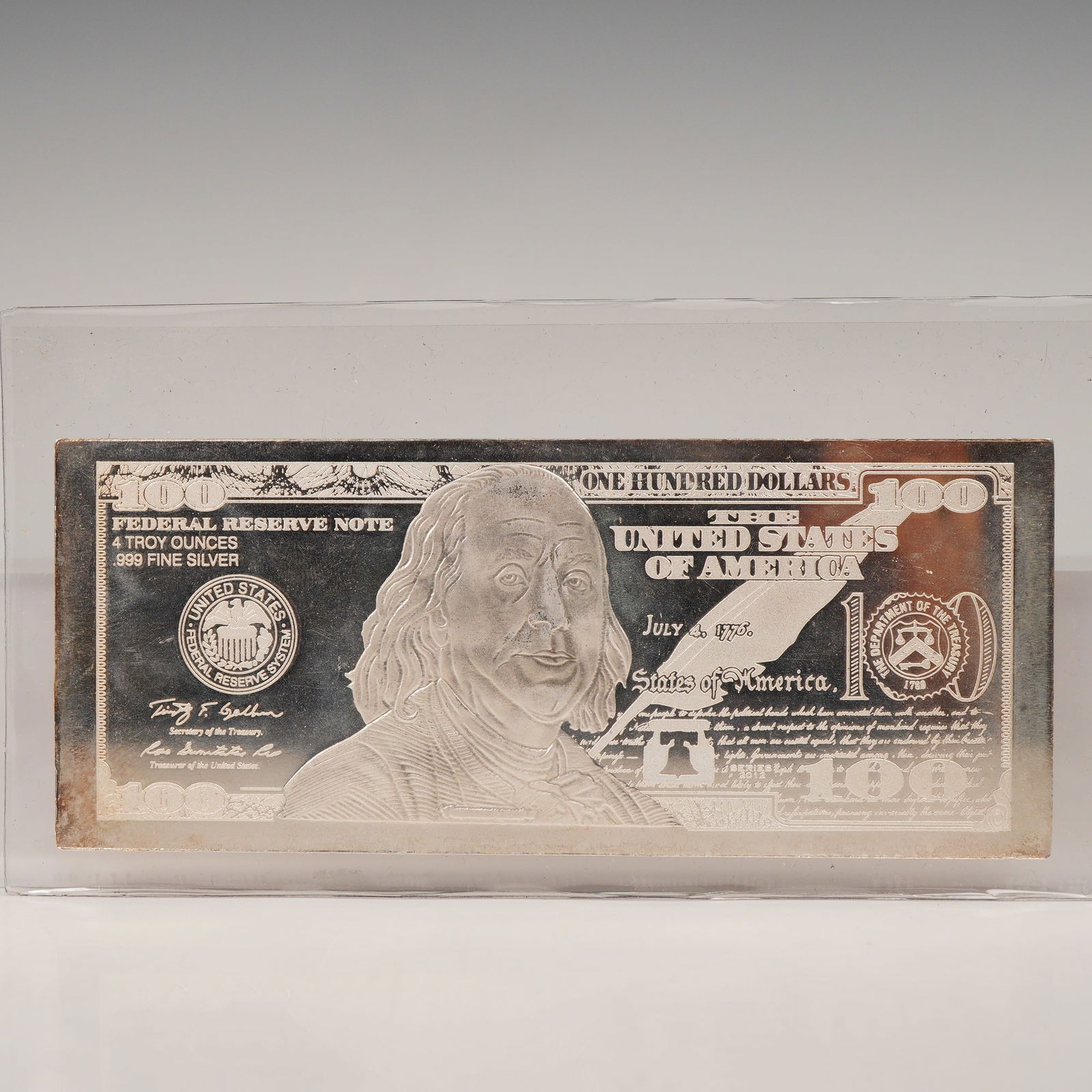 2012 $100 Federal Reserve Note Silver Proof Certificate: Silver proof ingot replicates the design of the United States $100 Federal Reserve Note. The obverse features a sculpted portrait of Benjamin Franklin along with inscriptions including Federal