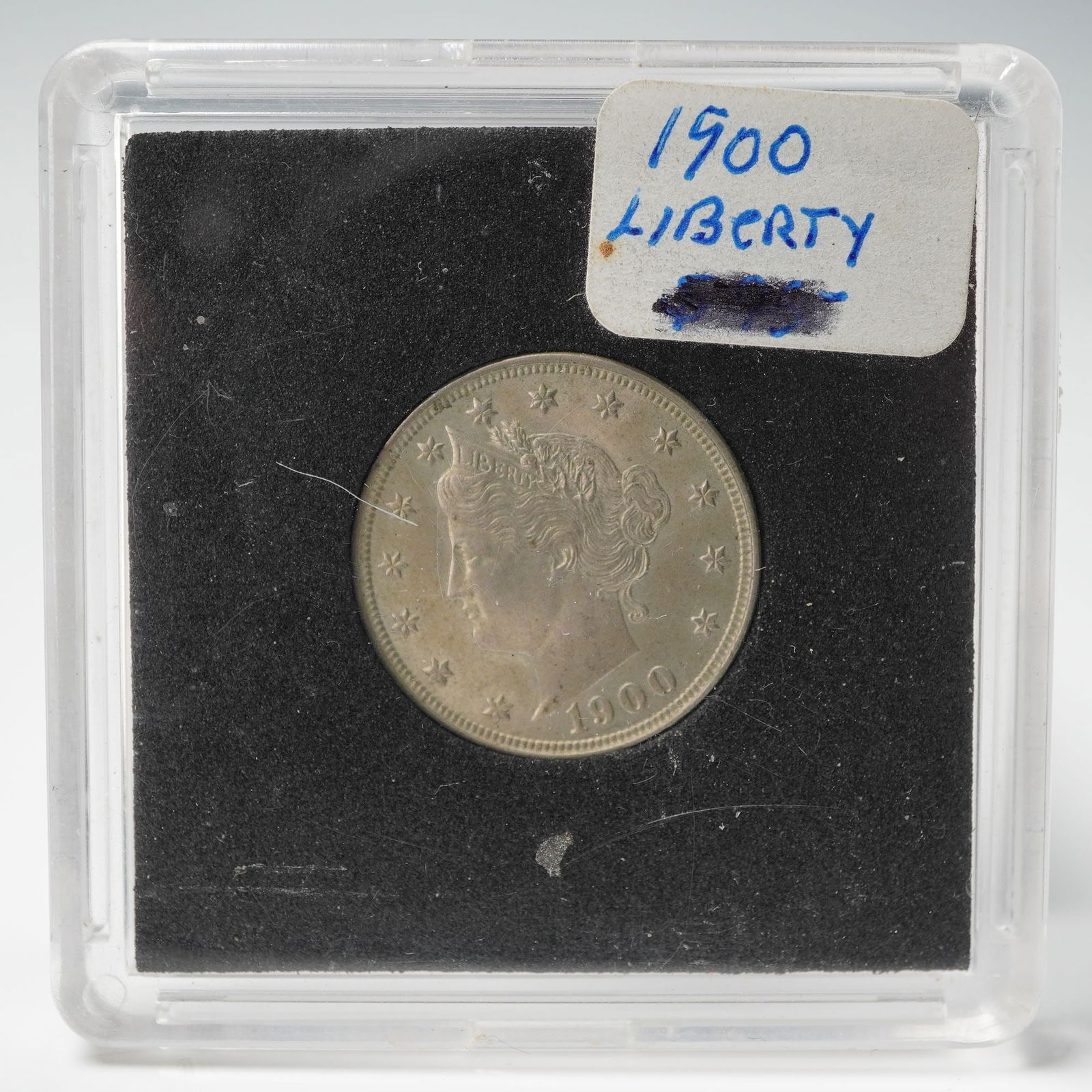 1900 Liberty Nickel: Liberty Head Nickel, composed of 75% copper and 25% nickel, displaying Charles E. Barber's classic Liberty portrait on the obverse with LIBERTY inscribed on the coronet and thirteen surrounding stars,