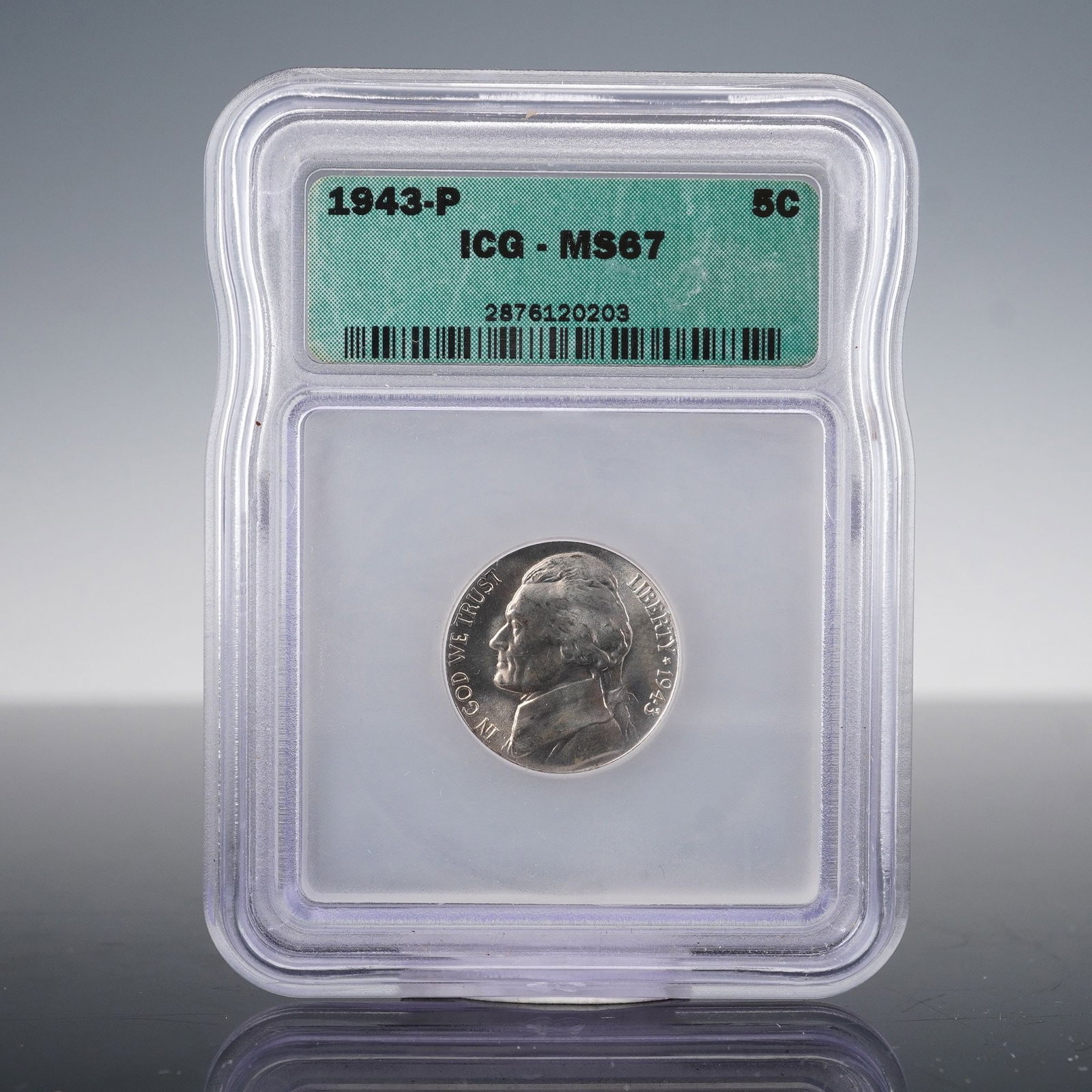 1943-P Jefferson Nickel MS67 ICG Certified Coin: This 1943-P Jefferson Nickel, minted in Philadelphia, has been graded MS67 by ICG, indicating it is nearly perfect with superb eye appeal. The reverse features the iconic Monticello design, and the co