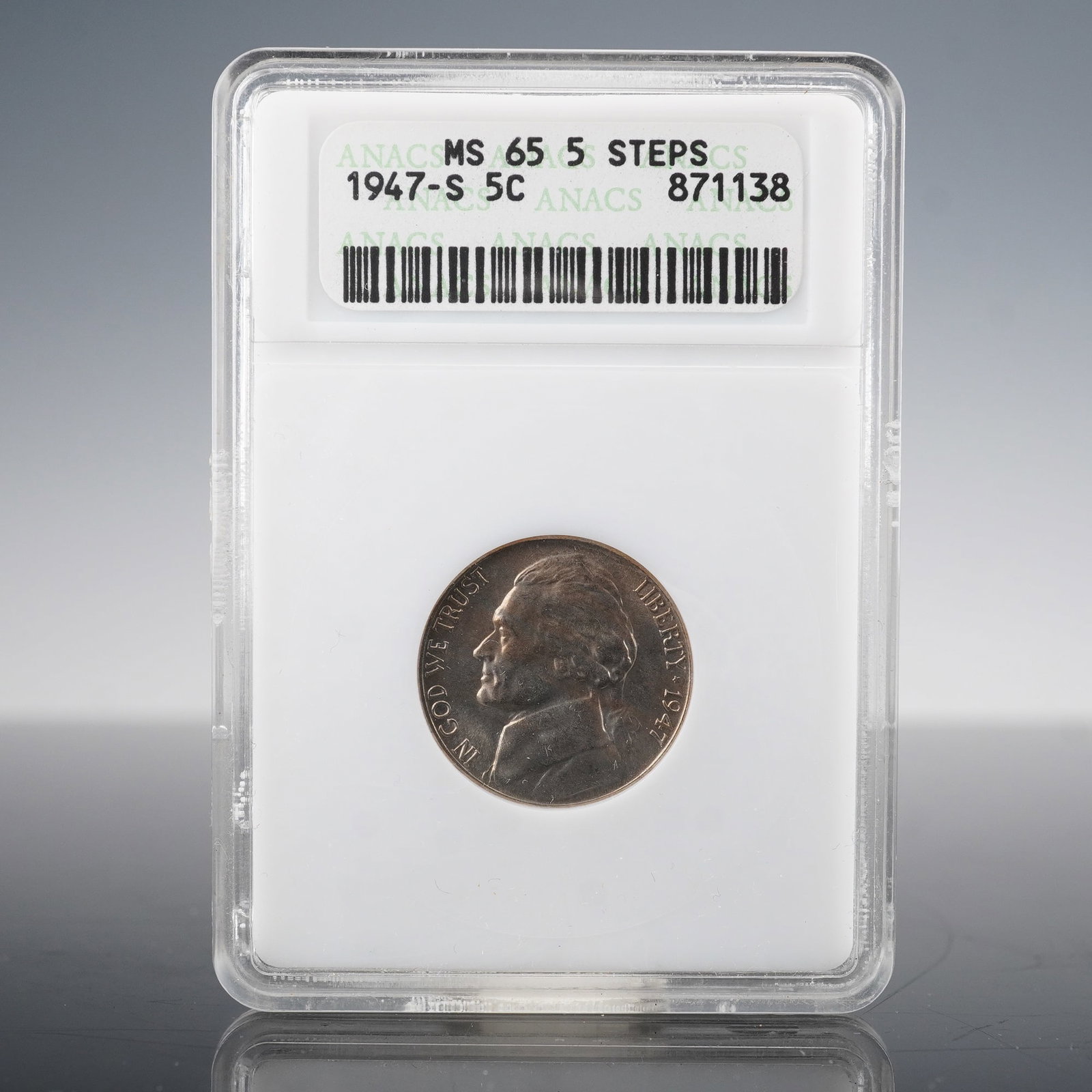 1947-S Jefferson Nickel MS65 5 Steps ANACS Graded: This 1947-S Jefferson Nickel, graded MS65 by ANACS, features strong luster and few marks. The reverse displays the iconic Monticello with all five steps clearly visible, earning the 5 Steps designatio