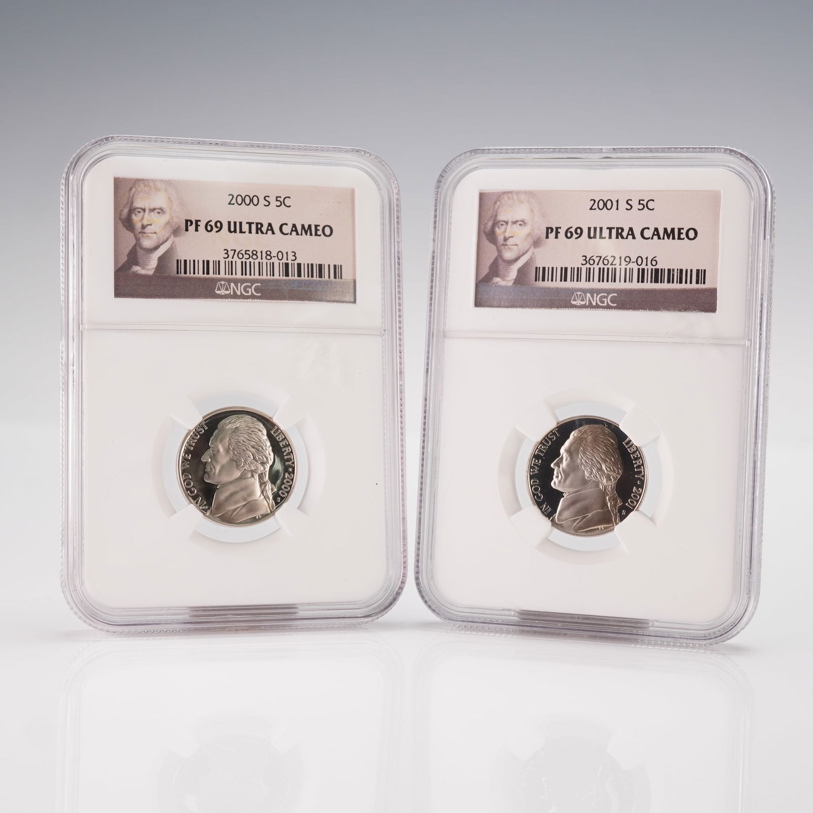 A Pair of 2000 S and 2001 S Jefferson Nickels, NGC PF 69 ULTRA CAMEO: A pair of modern United States proof Jefferson Nickels, dated 2000 S and 2001 S respectively. Each coin is individually encapsulated in a plastic holder and graded by the Numismatic Guaranty Corporati