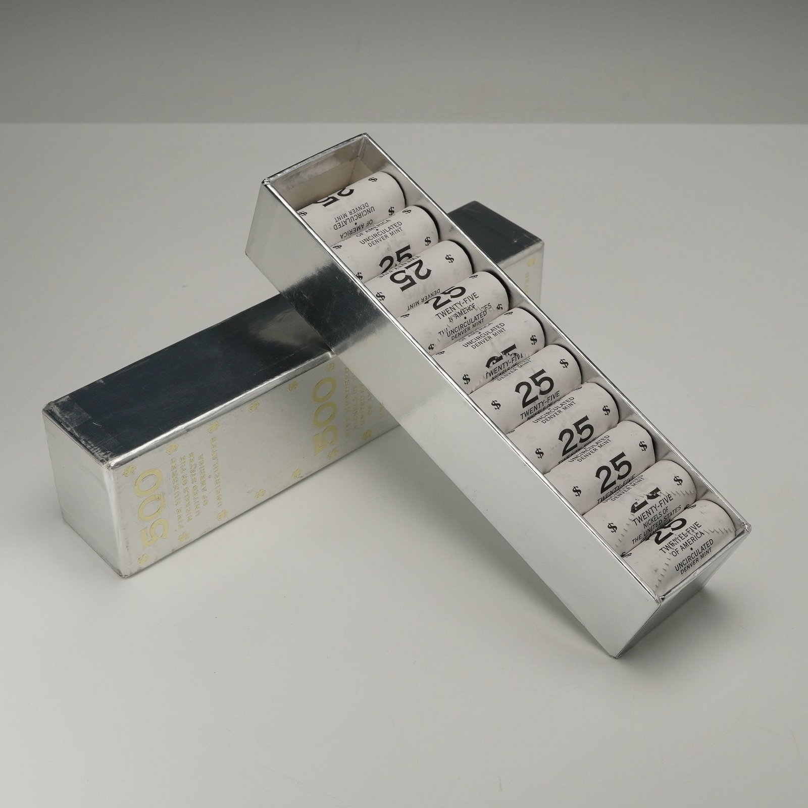500pc 2006-D Jefferson Nickel Uncirculated Coins Bank Box: Presented in its original World Reserve Monetary Exchange packaging, this 2006-D Jefferson Nickel Bank Box contains twenty wrapped rolls of twenty-five coins each. Each uncirculated nickel features th