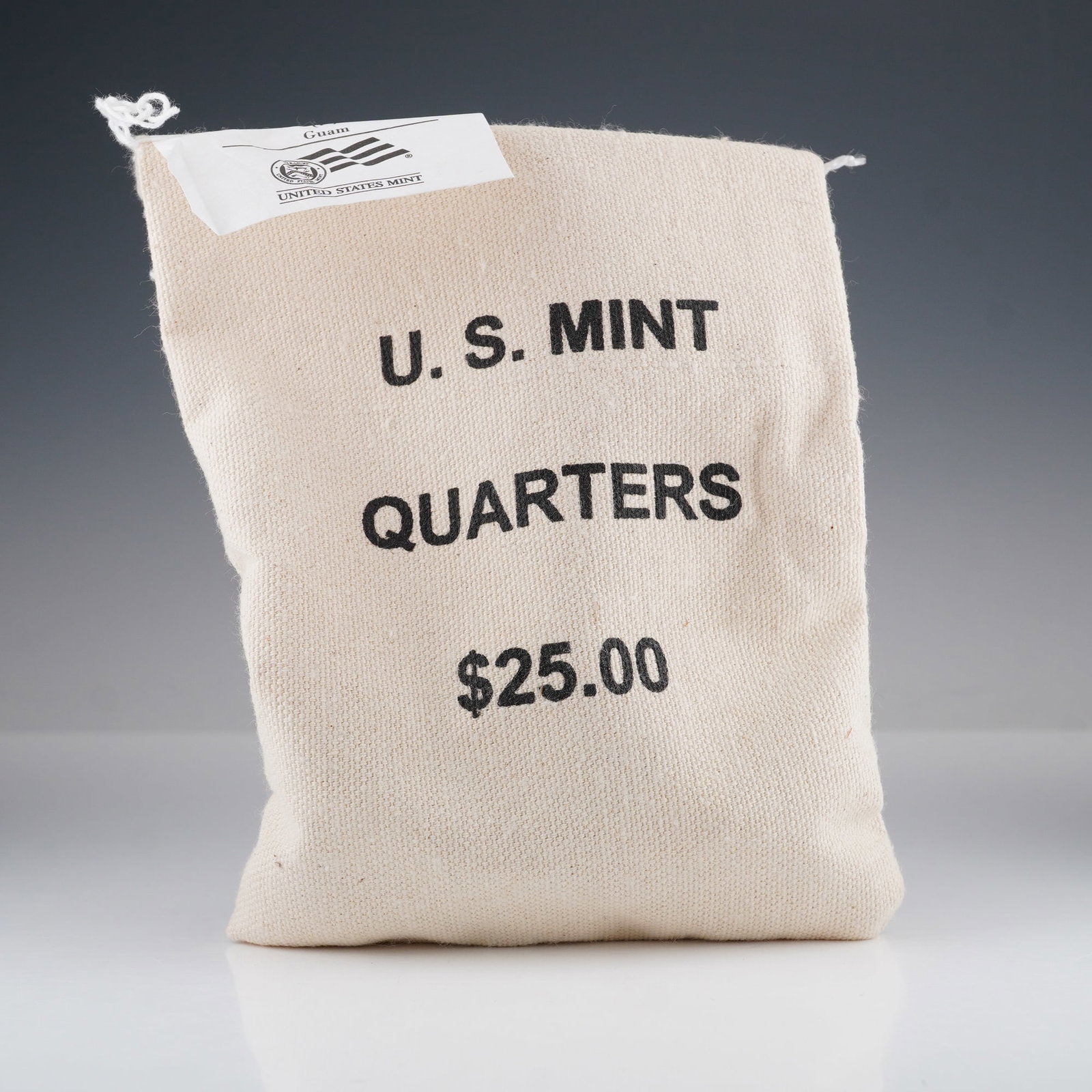 2009-P District of Columbia and U.S. Territories Guam Quarters $25 Mint Bag: An official 2009 U.S. Mint $25 quarter bag from the District of Columbia and U.S. Territories series, featuring the Guam design. This sealed canvas bag contains 100 quarters struck at the Philadelphia