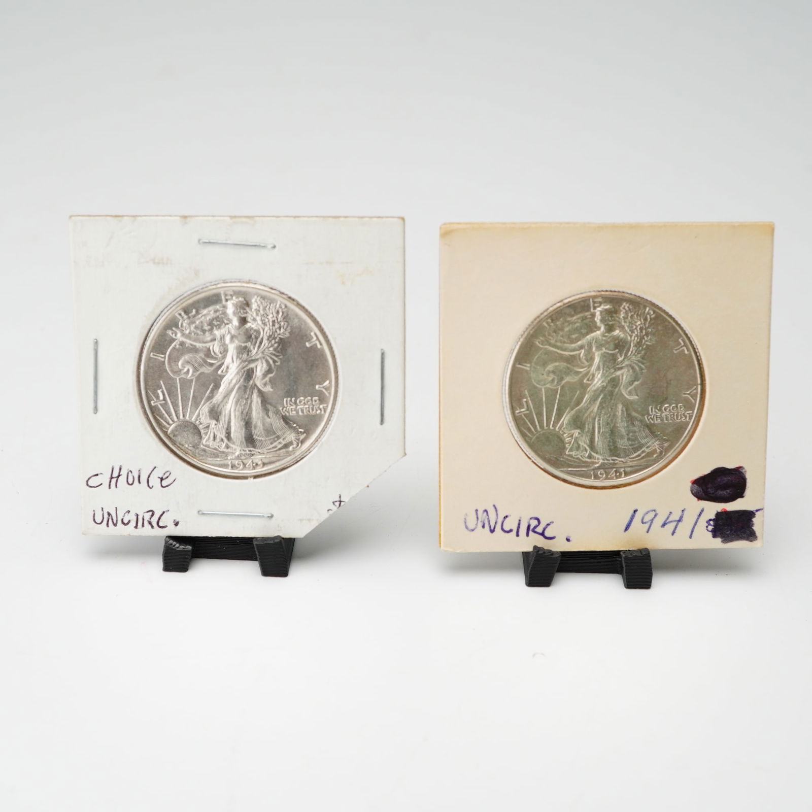 2pc 1941-(P) to 1943-(P) Walking Liberty Silver Half Dollars: Each struck at the Philadelphia Mint with a metal composition of 90 percent silver and 10 percent copper, containing approximately 0.3617 troy ounces of silver per coin. The obverse features LIBERTY s