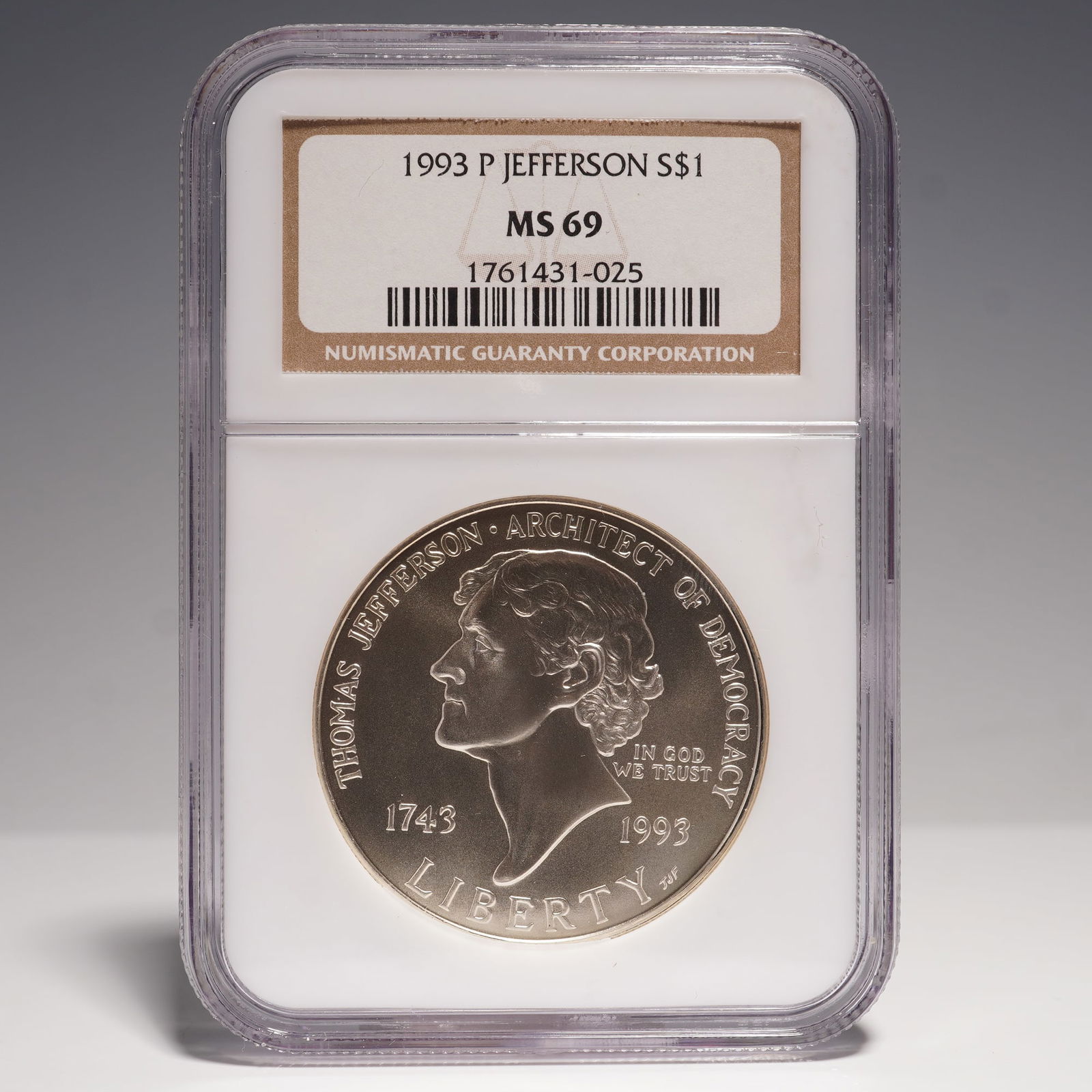 1993-P Thomas Jefferson Silver Dollar NGC Graded MS 69: Issued in 1993 to commemorate the 250th anniversary of Thomas Jefferson's birth, this silver dollar has been graded MS 69 by NGC. The obverse, designed by T. James Ferrell, features a portrait of Jeff