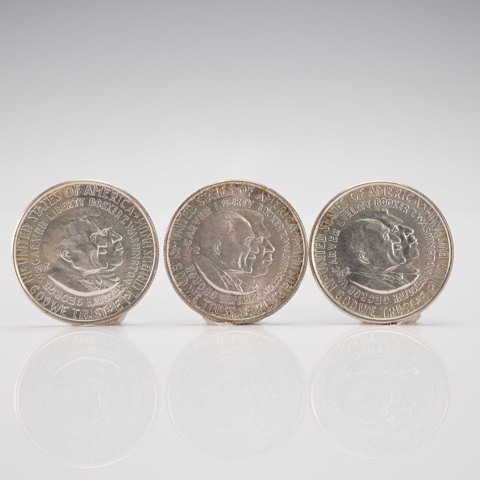3pc 1952 Washington-Carver 1/2 Dollar Coins: Each struck in 90 percent silver with a total weight of 12.5 grams, feature on the obverse the conjoined portraits of George Washington Carver and Booker T. Washington with inscriptions UNITED STATES 