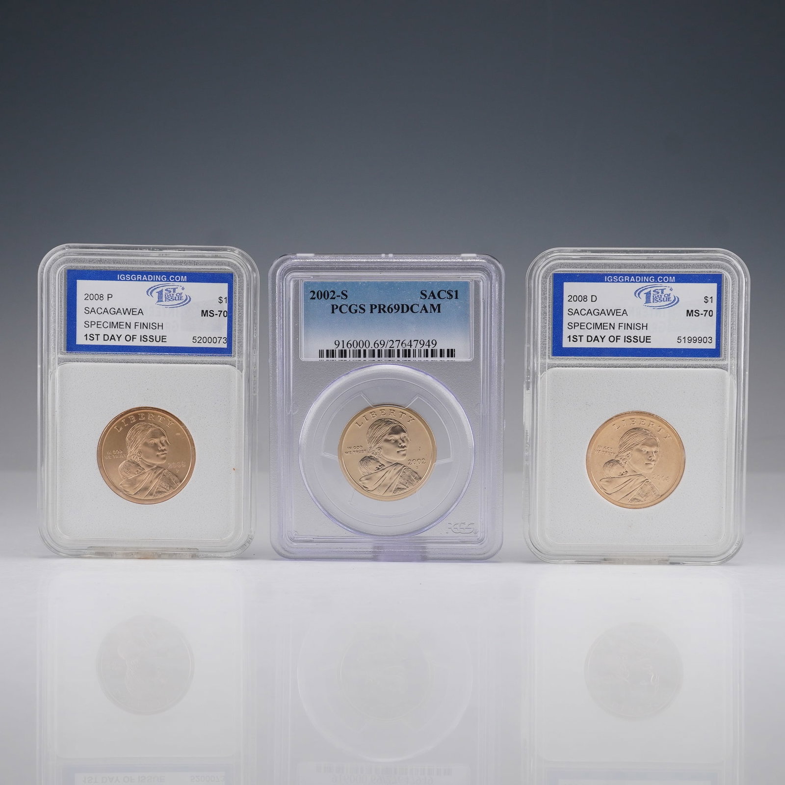 3pc 2002-S, 2008-P, and 2008-D Sacagawea Dollars PCGS & IGS Graded: A trio of certified Sacagawea dollars including one 2002-S Proof graded PR69DCAM by PCGS, one 2008-P Specimen Finish graded MS70 by IGS, and one 2008-D Specimen Finish graded MS70 by IGS. Each coin fe