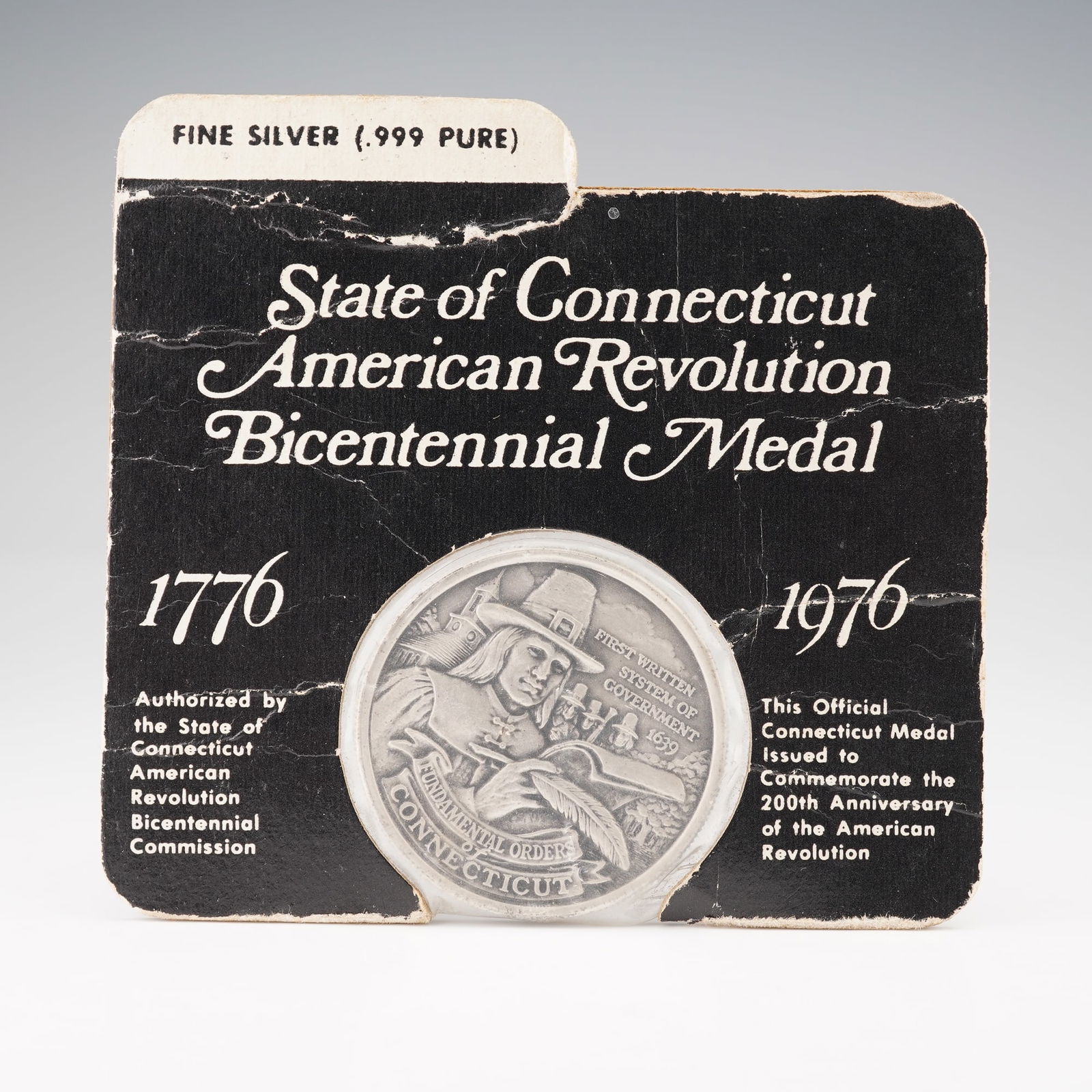 1976 State of Connecticut American Revolution Bicentennial Silver Medal: Issued by the State of Connecticut to commemorate the 200th Anniversary of the American Revolution, this official bicentennial medal is struck in fine silver (.999 pure). The obverse features an image