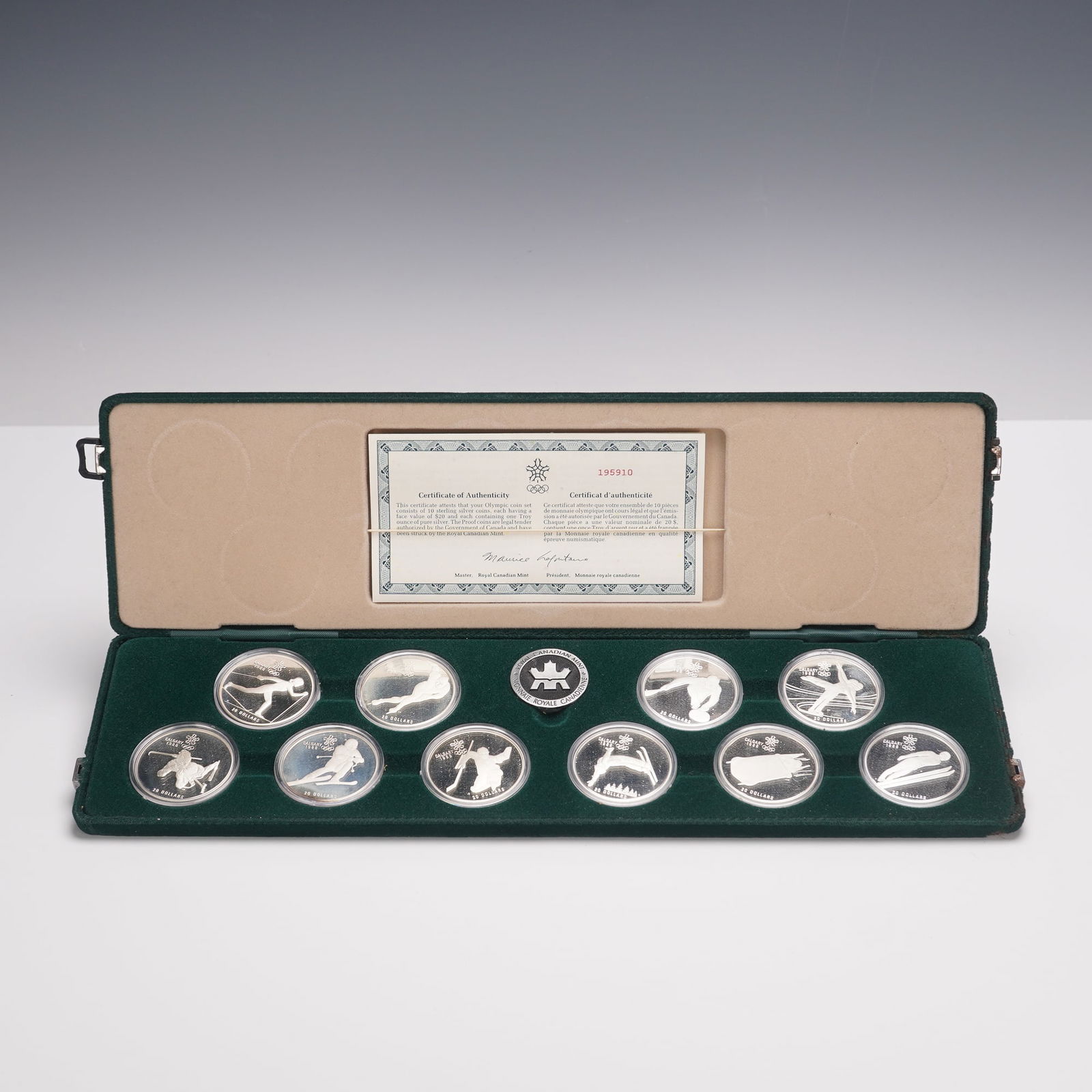 1988 Calgary Winter Olympics Sterling Silver 10pc Coin Proof Set: Official Royal Canadian Mint Commemorative 10 piece sterling silver (.925) set for the 1988 Winter Olympic Games in Calgary, housed in the original fitted presentation case with green velvet interior