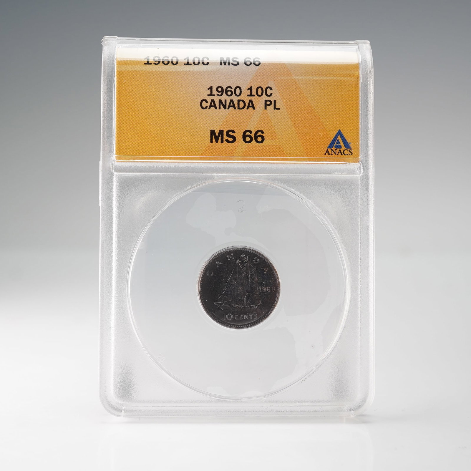 1960 Canada Ten Cents Proof-Like (PL) ANACS MS 66: A 1960 Canada Ten Cents coin certified ANACS MS 66 with a Proof-Like (PL) finish, struck in 80% silver and 20% copper. The obverse features the young effigy of Queen Elizabeth II by Mary Gillick, acco